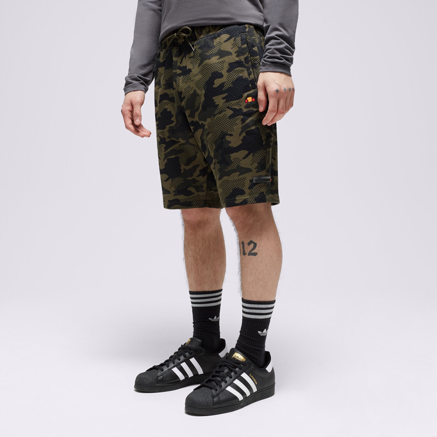 Femei pantaloni scurți ELLESSE PANTALONI SCURȚI LIONAMO SHORT CAMO SHM13953500 Kaki