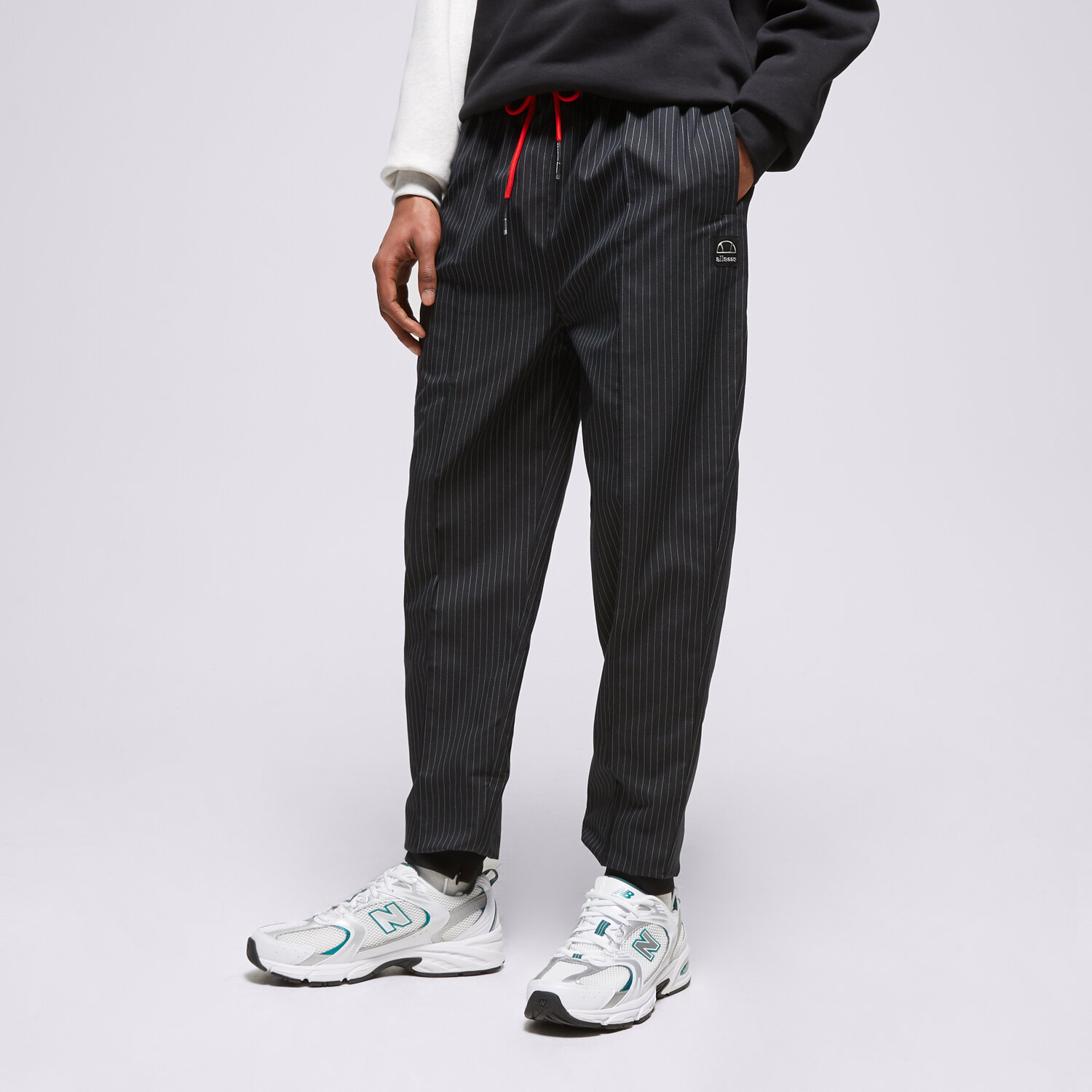 Bărbați pantaloni ELLESSE PANTALONI  CLIFFORD TRACK PANT BLK SHP15887011 Negru