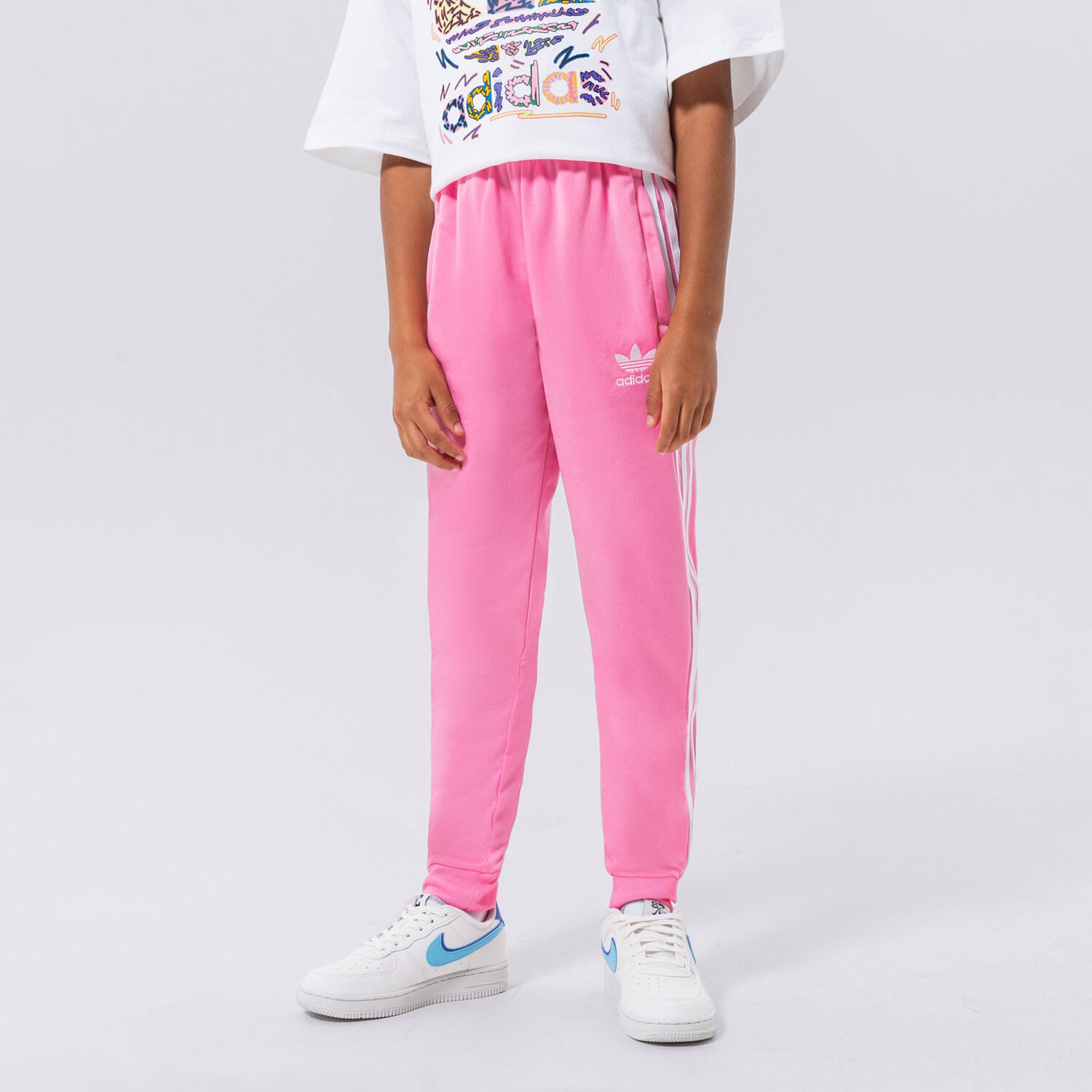 Pantaloni pentru copii ADIDAS PANTALONI  SST TRACK PANTS GIRL HK0329 Roz