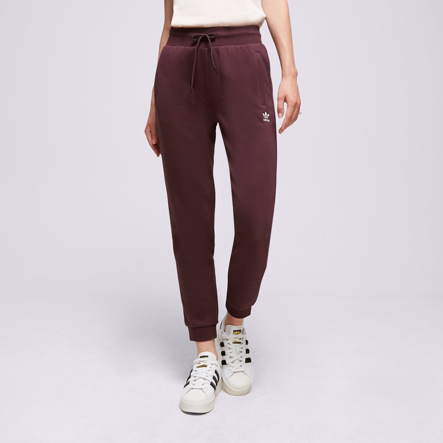 Femei pantaloni ADIDAS PANTALONI  TREF ESS JOG S'MAR IB2804 Maro