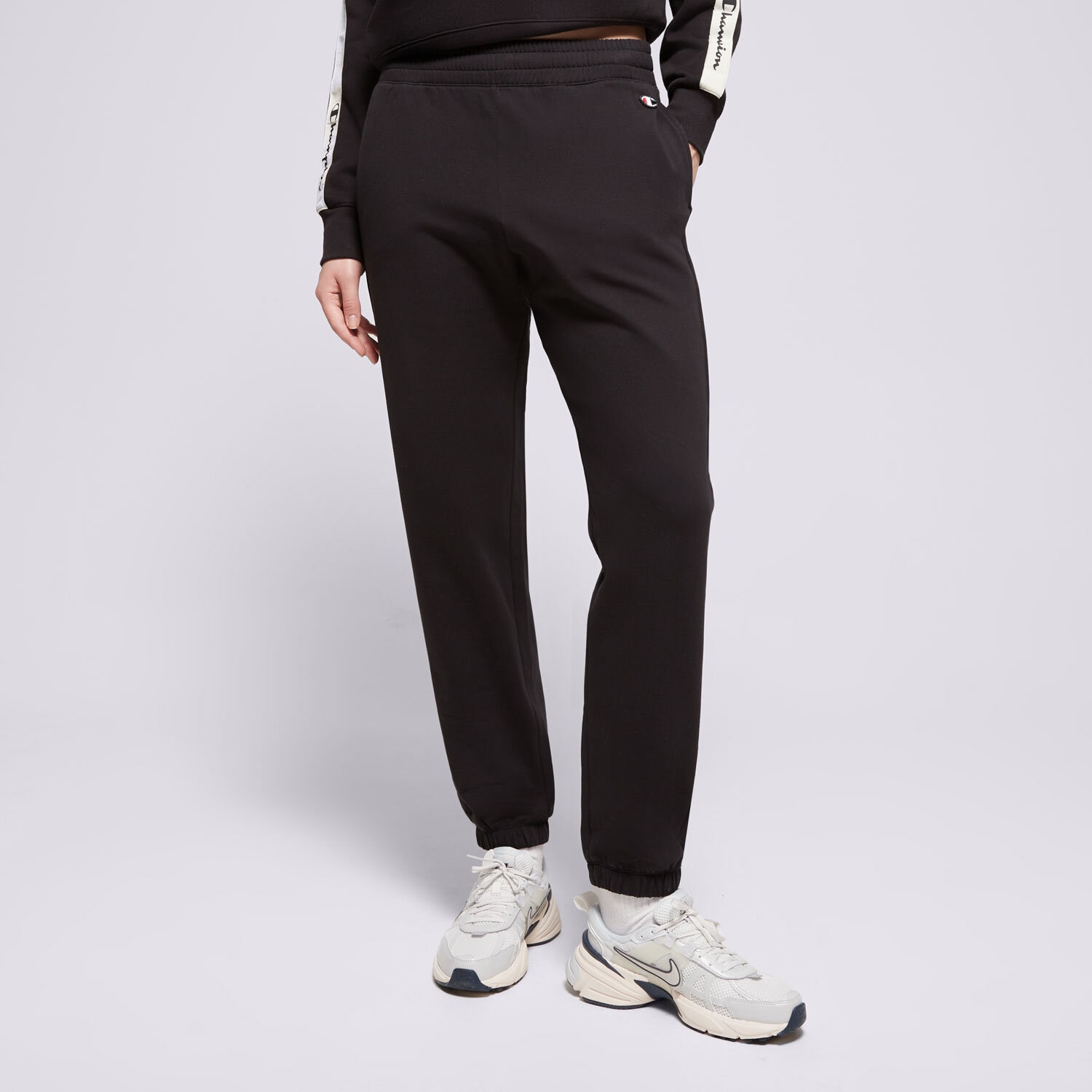 Femei pantaloni CHAMPION PANTALONI  ELASTIC CUFF PANTS 116610KK001 Negru