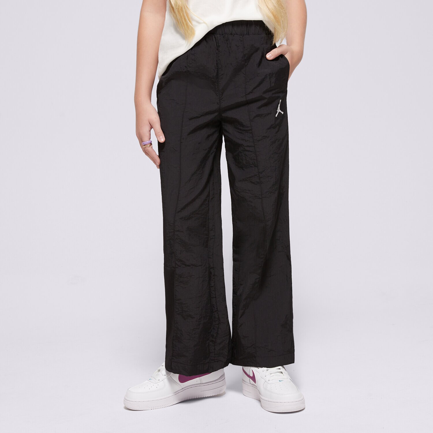 Pantaloni pentru copii JORDAN PANTALONI  JDG JUMPMAN WOVEN TAPING PANT GIRL 45D346-023 Negru