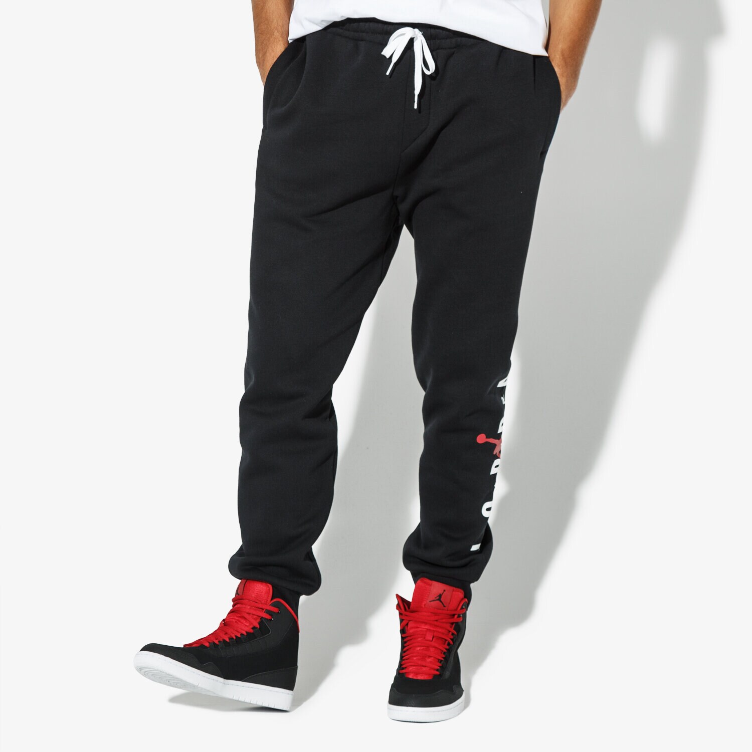 Bărbați pantaloni JORDAN PANTALONI  JUMPMAN AIR GFX FLEECE PANT AA1454-010 Negru
