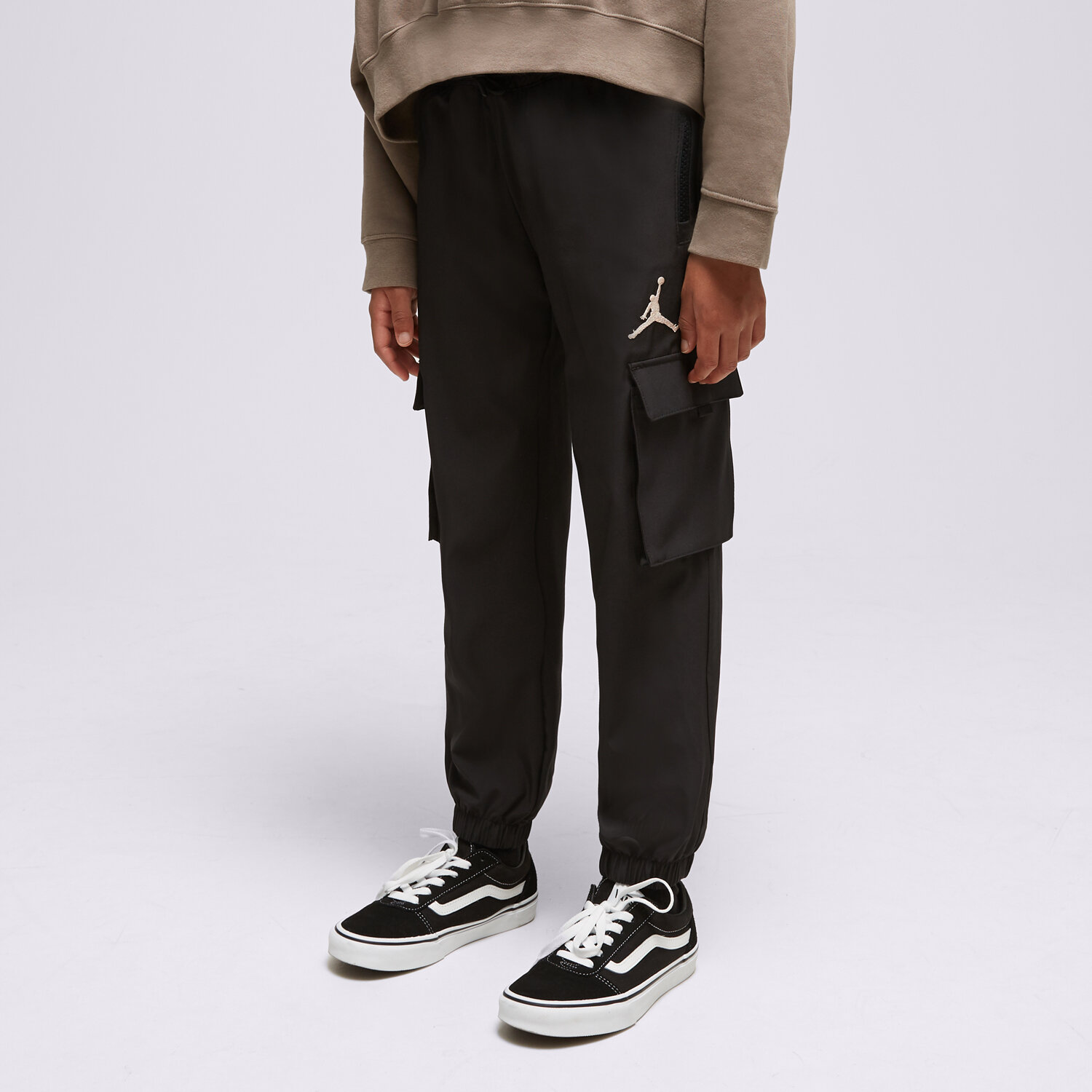 Pantaloni pentru copii JORDAN PANTALONI  JDG JORDAN POST UP CARGO G 45C654-023 Negru