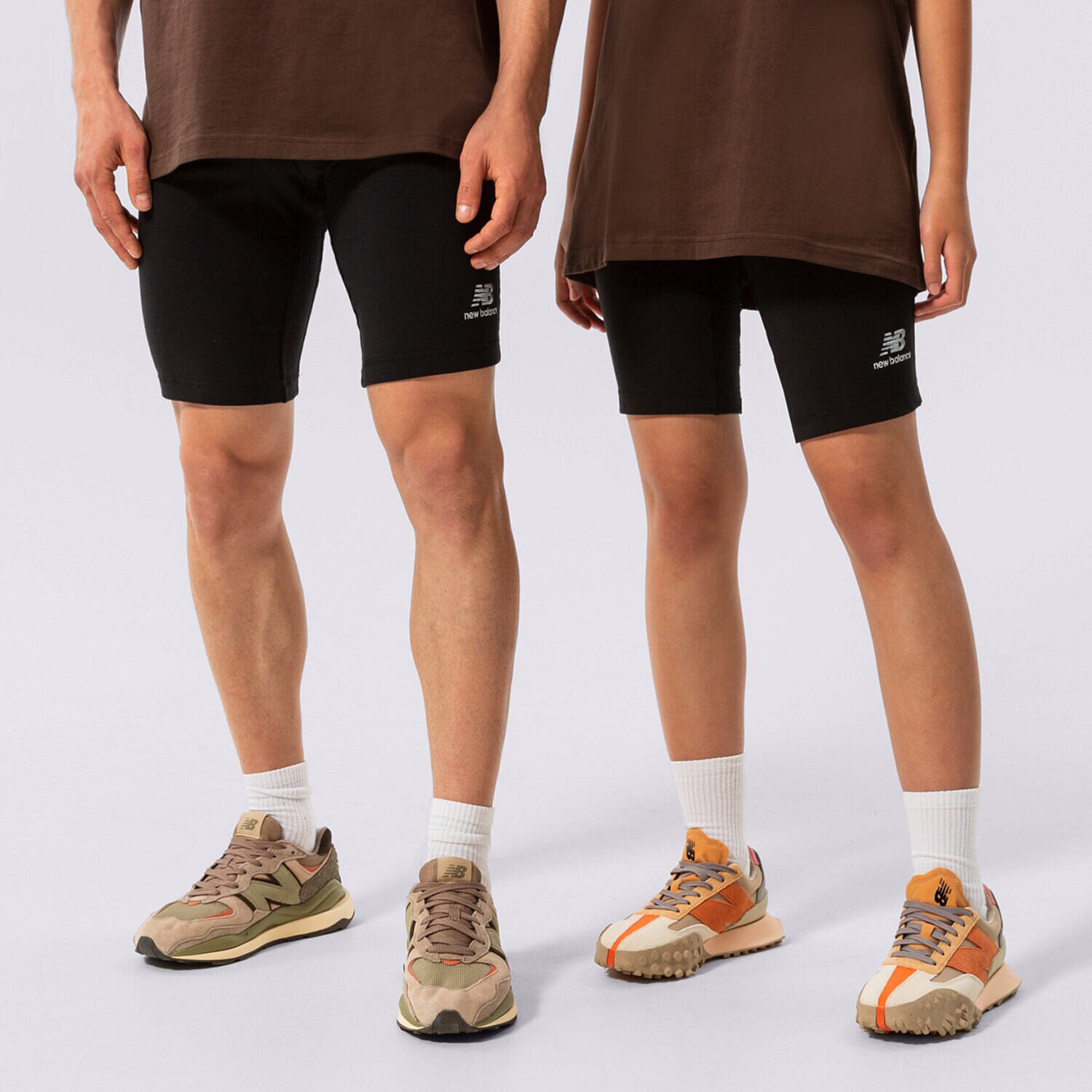 Femei pantaloni scurți NEW BALANCE PANTALONI SCURȚI NB ESSENTIALS   UNI-SSENTIALS L US21501BK Negru