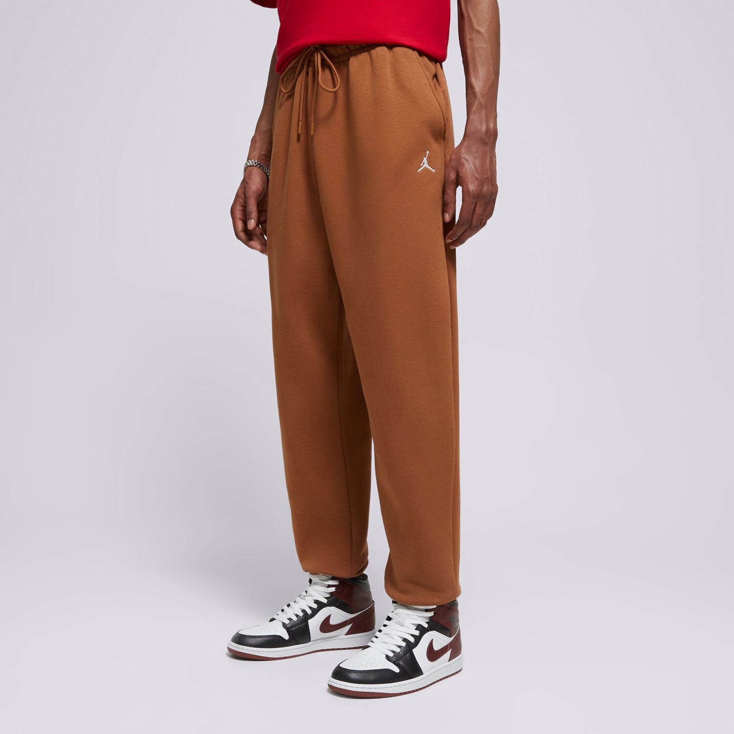Bărbați pantaloni JORDAN PANTALONI  M J ESS FLC FJ7779-281 Maro