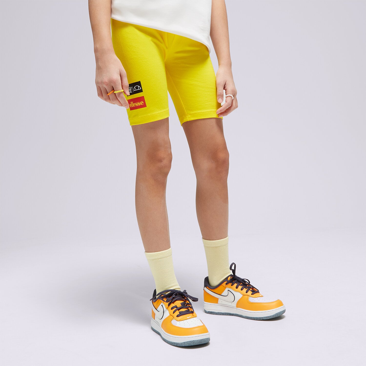 Pantaloni scurți și rochii pentru copii ELLESSE PANTALONI SCURȚI   YELLOWISH JNR SHORT YELLOW S4ML15228606 Galben