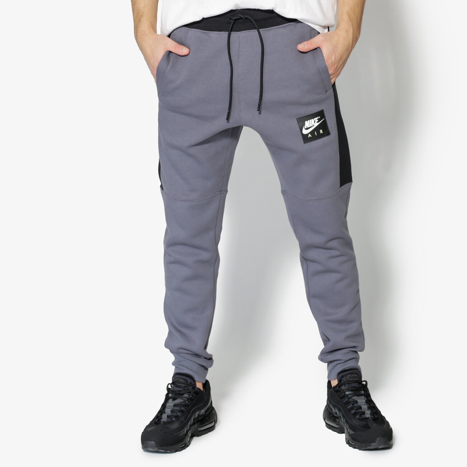Bărbați pantaloni NIKE PANTALONI  M NSW JGGR AIR FLC 886048-021 Gri