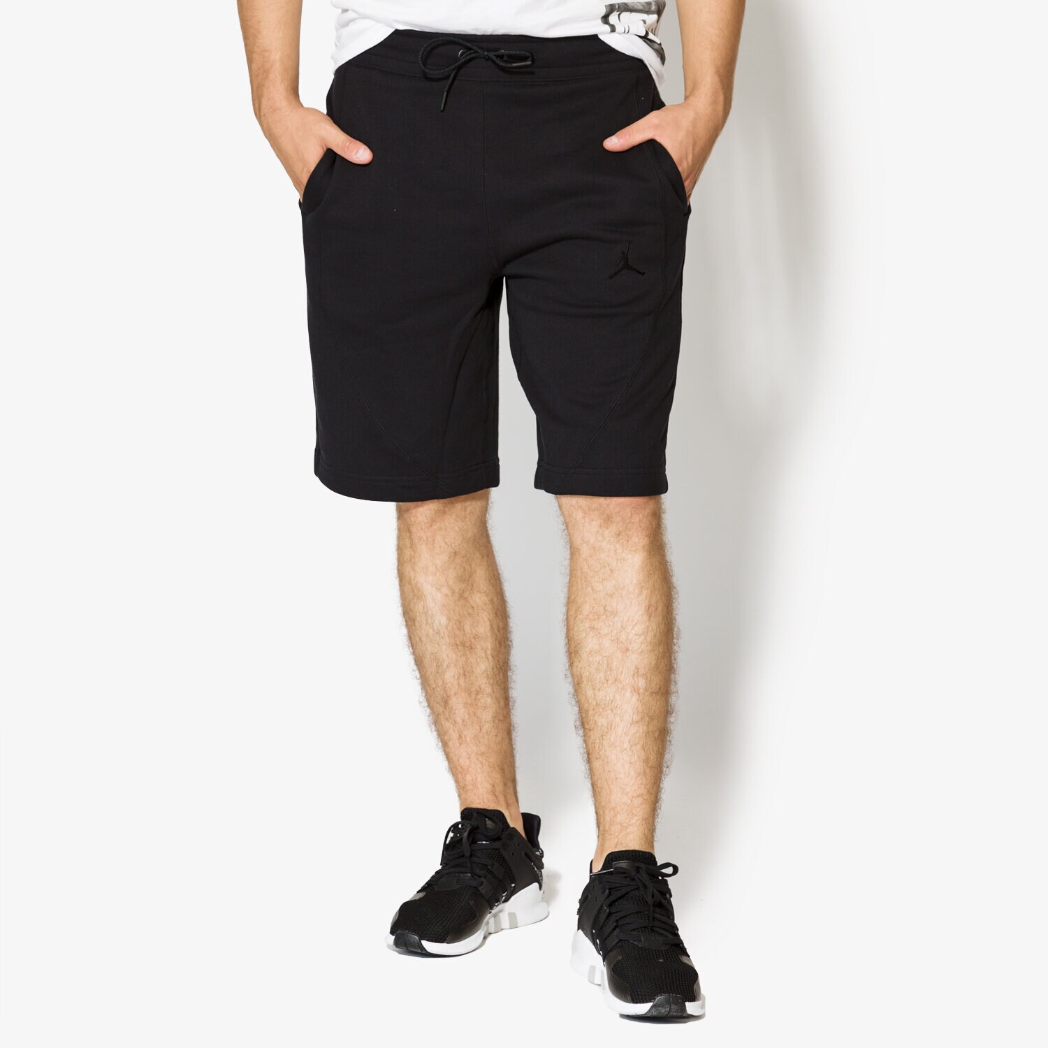 Femei pantaloni scurți JORDAN PANTALONI SCURȚI JSW WINGS FLEECE SHORT 884278013 Negru