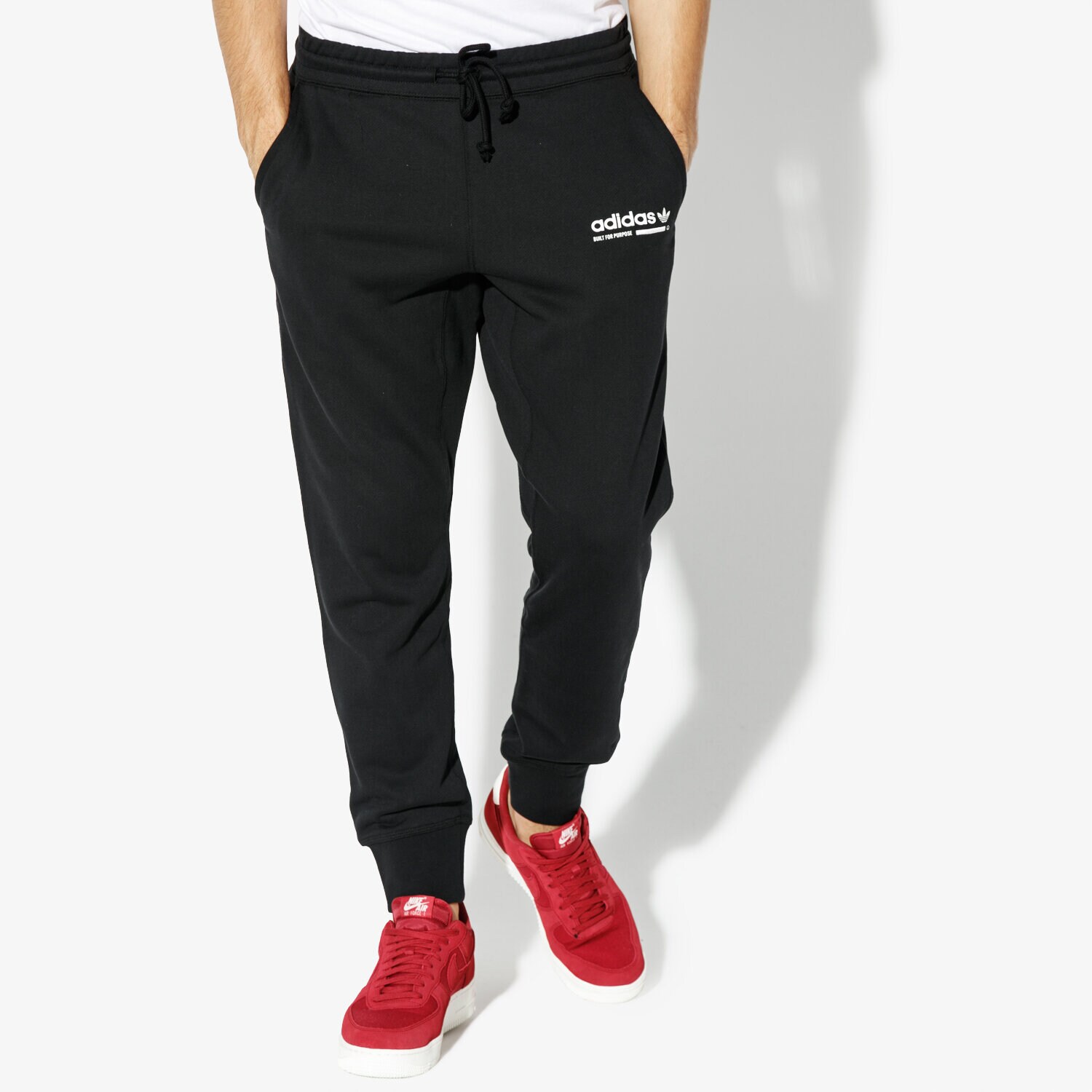 Bărbați pantaloni ADIDAS PANTALONI  KAVAL SWEATPANT ORIGINALS CORE DH4936 Negru