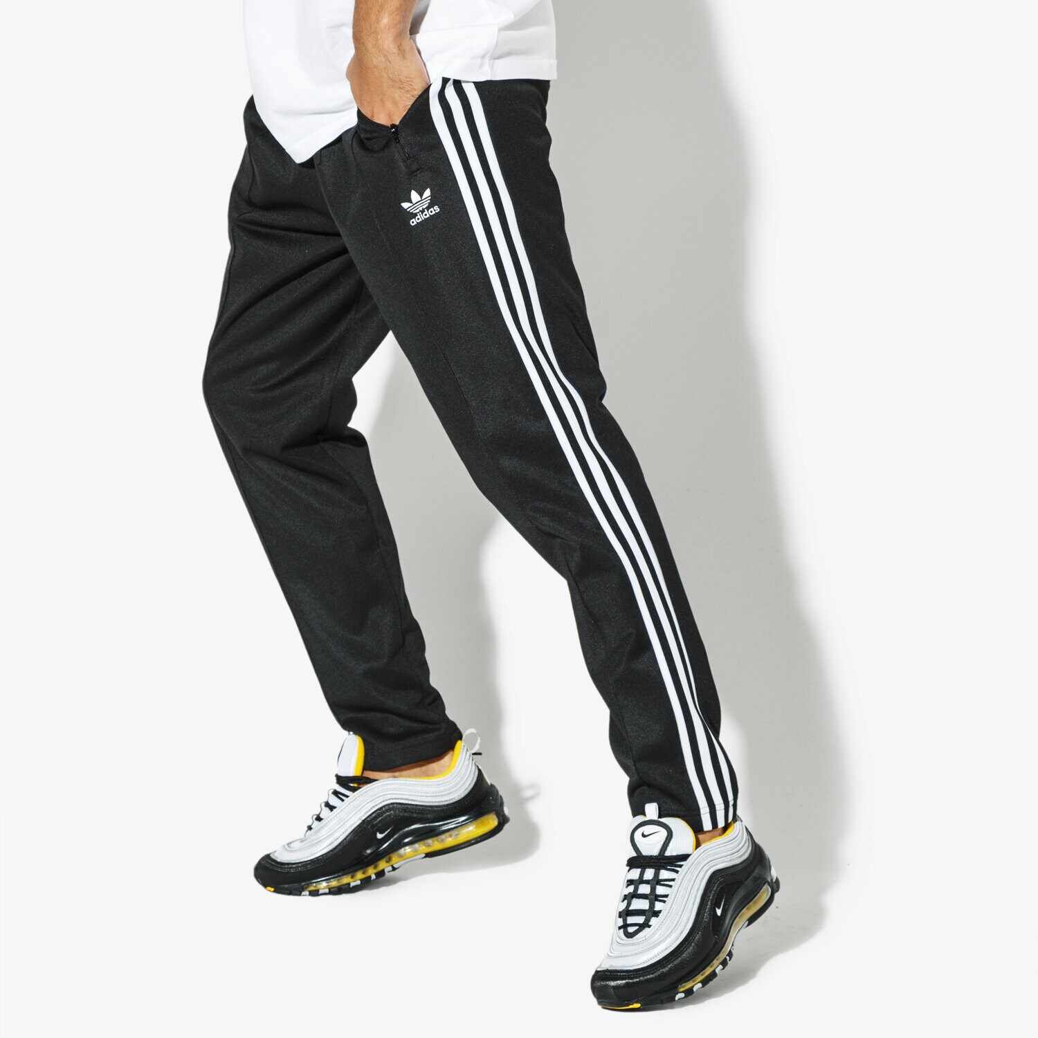 Bărbați pantaloni ADIDAS PANTALONI  BECKENBAUER TP ADICOLOR CW1269 Negru