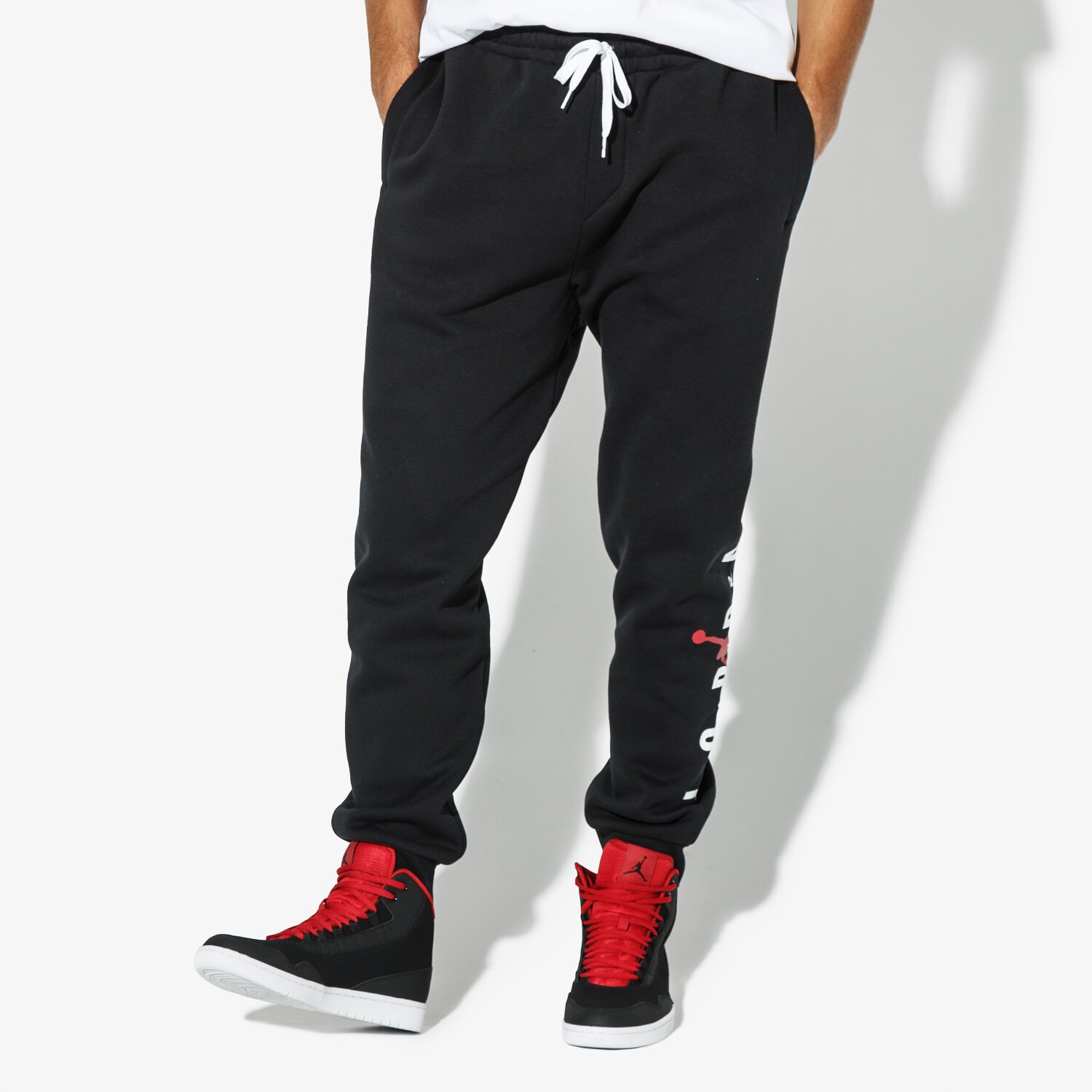 Bărbați pantaloni JORDAN PANTALONI  JUMPMAN AIR GFX FLEECE PANT AA1454-010 Negru