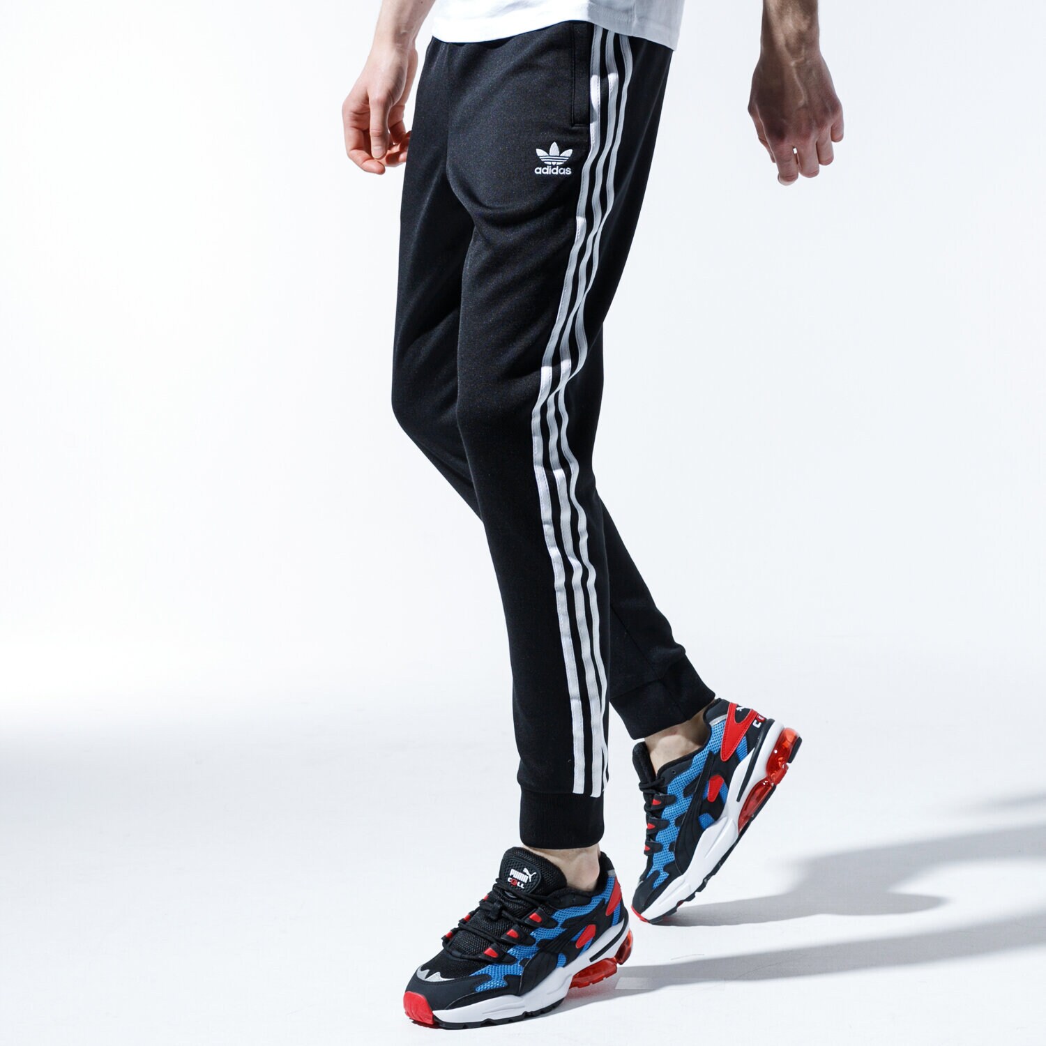 Bărbați pantaloni ADIDAS PANTALONI SST TPBLACK CW1275 Negru