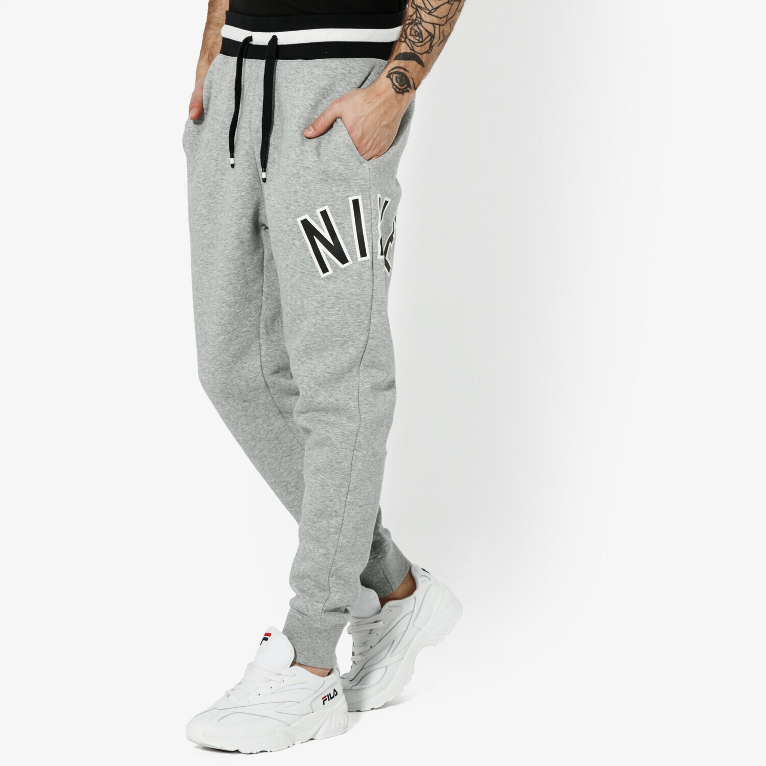 Bărbați pantaloni NIKE PANTALONI M NSW NIKE AIR PANT FLC SPORTSWEAR AR1824-063 Gri
