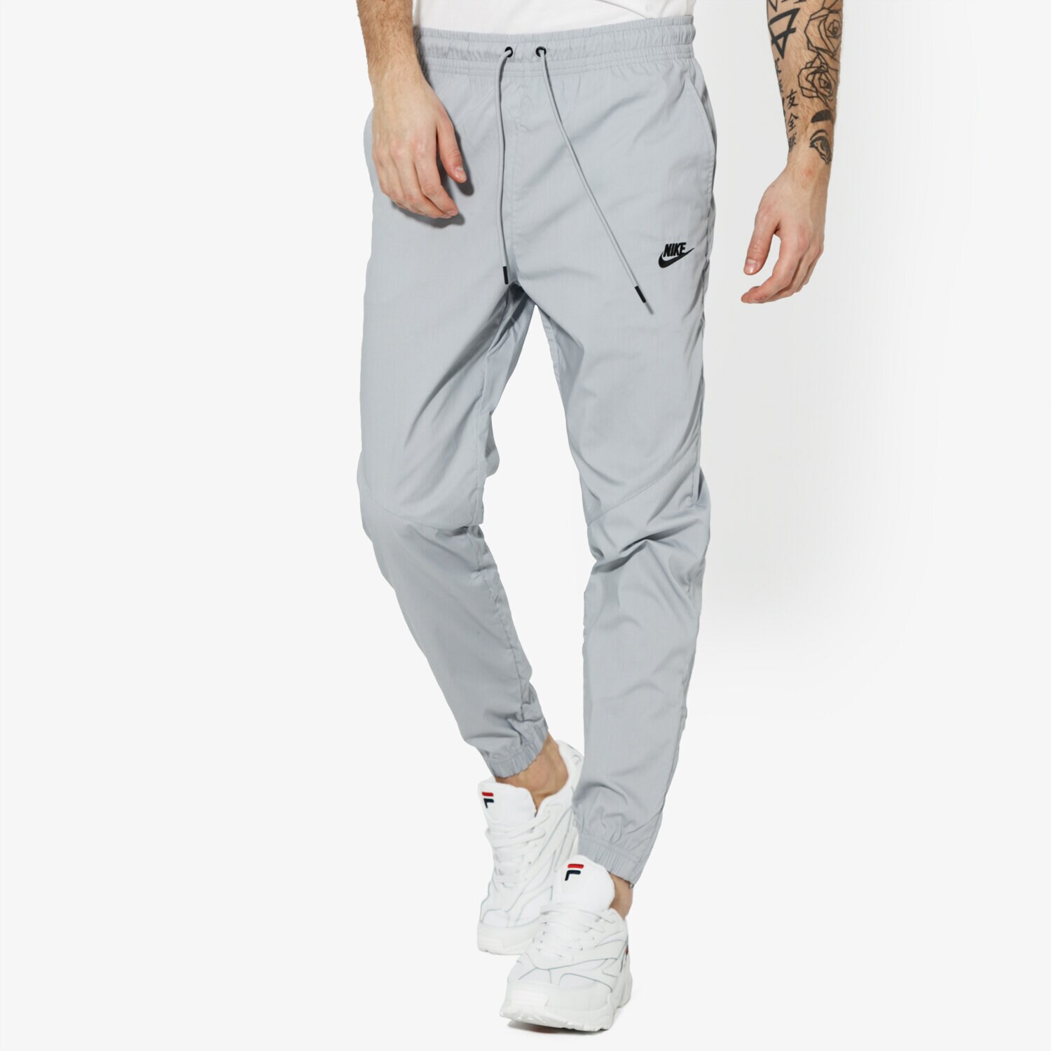 Bărbați pantaloni NIKE PANTALONI  M NSW PANT WR STREET SPORTSWEAR AR2368-012 Gri