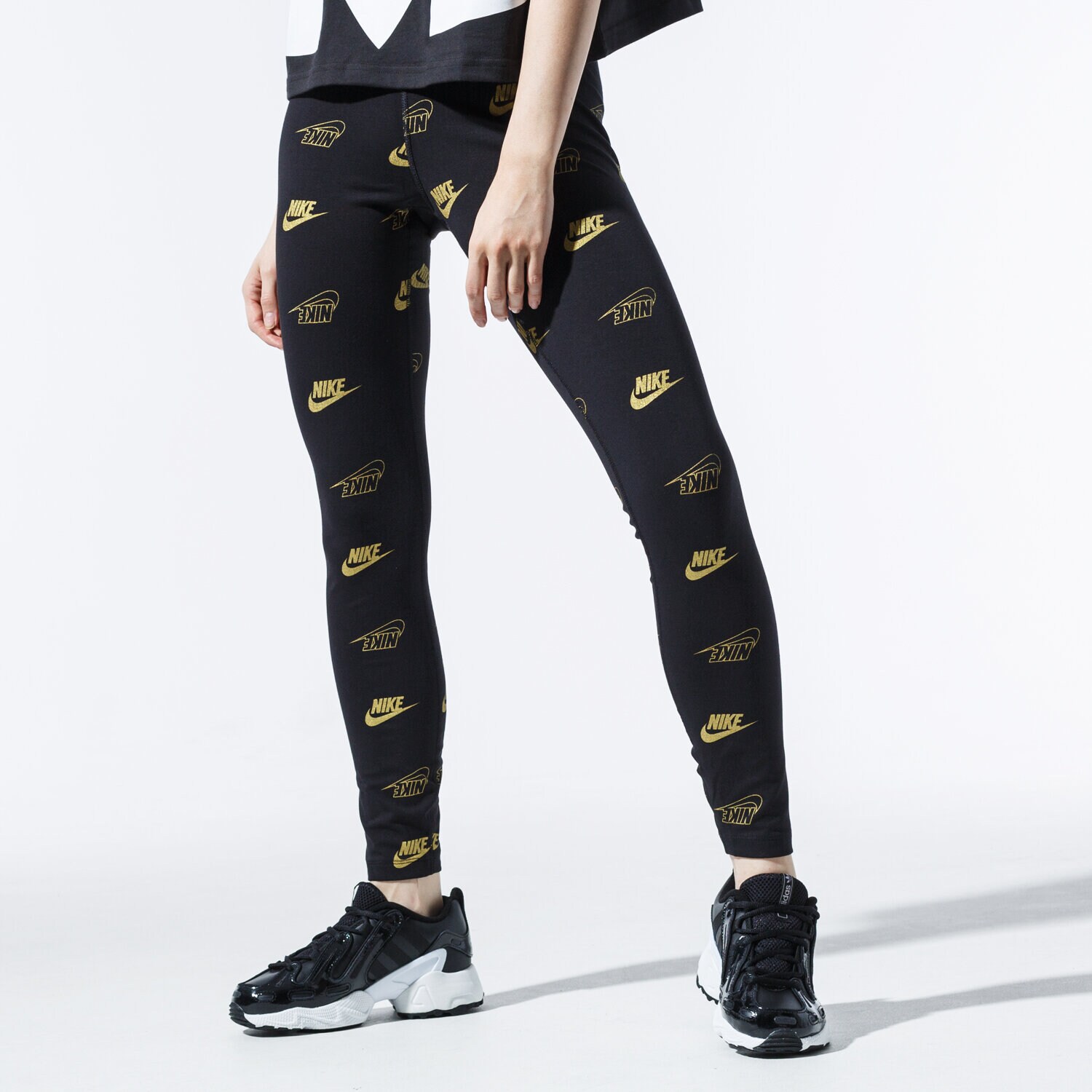 Femei pantaloni NIKE PANTALONI  W NSW LGGNG AOP SHINE BFF CJ4061-010 Negru