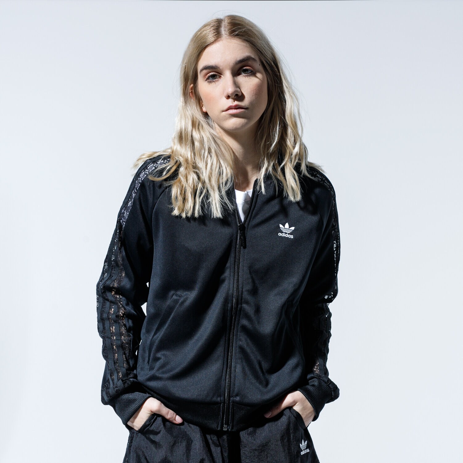 Femei bluză ADIDAS BLUZĂ TRACKTOP FL4129 Negru
