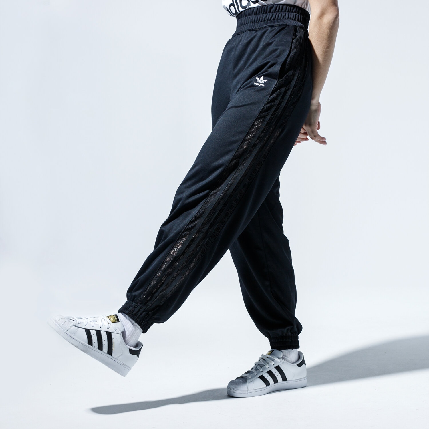 Femei pantaloni ADIDAS PANTALONI  TRACKPANT FL4125 Negru