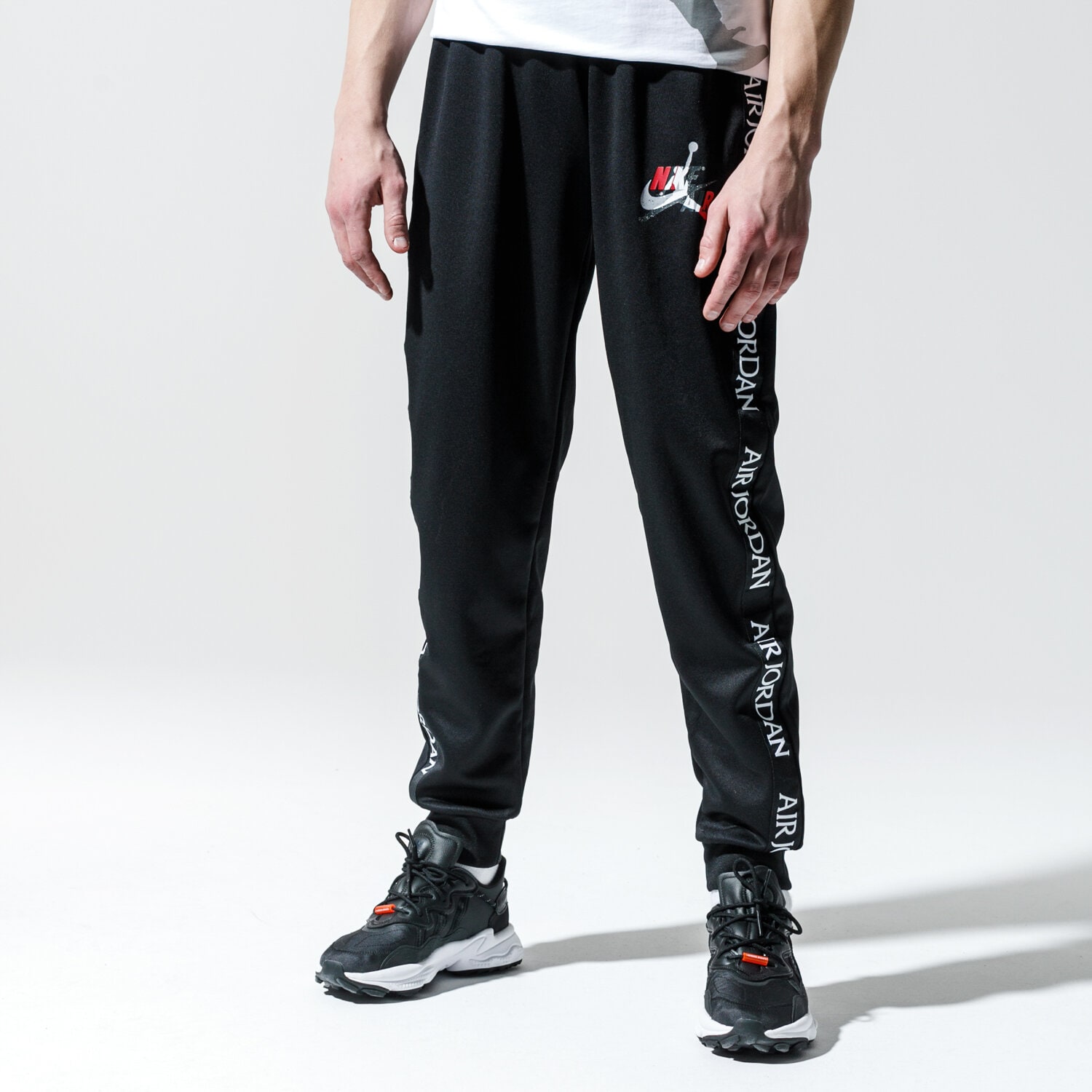 Bărbați pantaloni JORDAN PANTALONI M J JM CLSCS TRICOT WRMP PANT CT9373-010 Negru