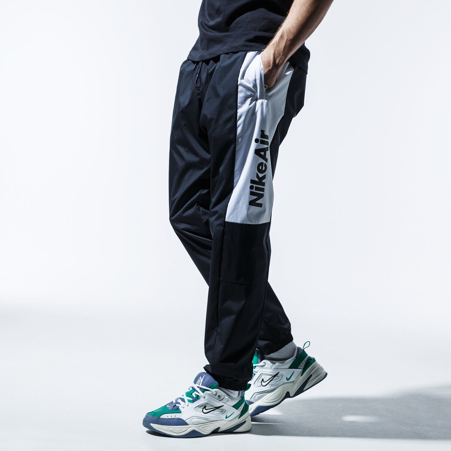 Bărbați pantaloni NIKE PANTALONI  AIR CK4395-010 Negru