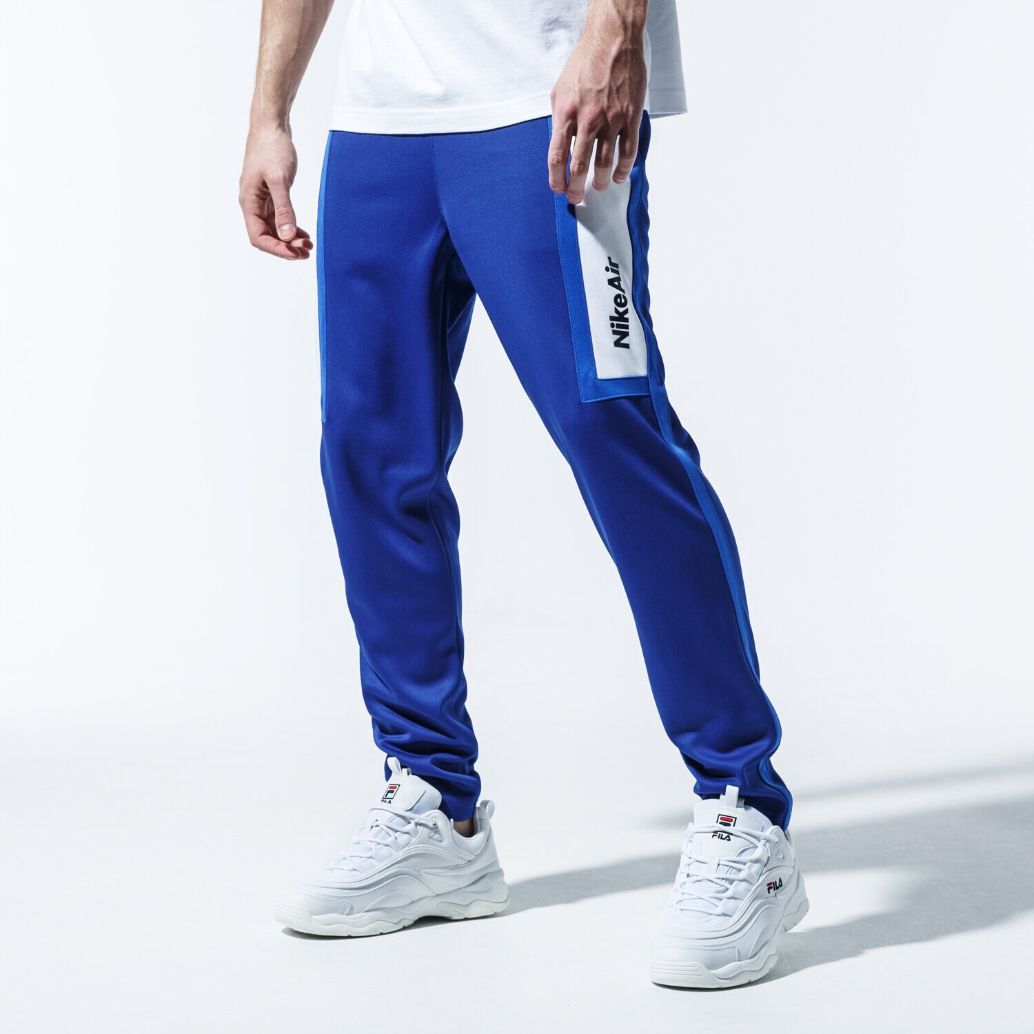 Bărbați pantaloni NIKE PANTALONI AIR CJ4838-455 Albastru