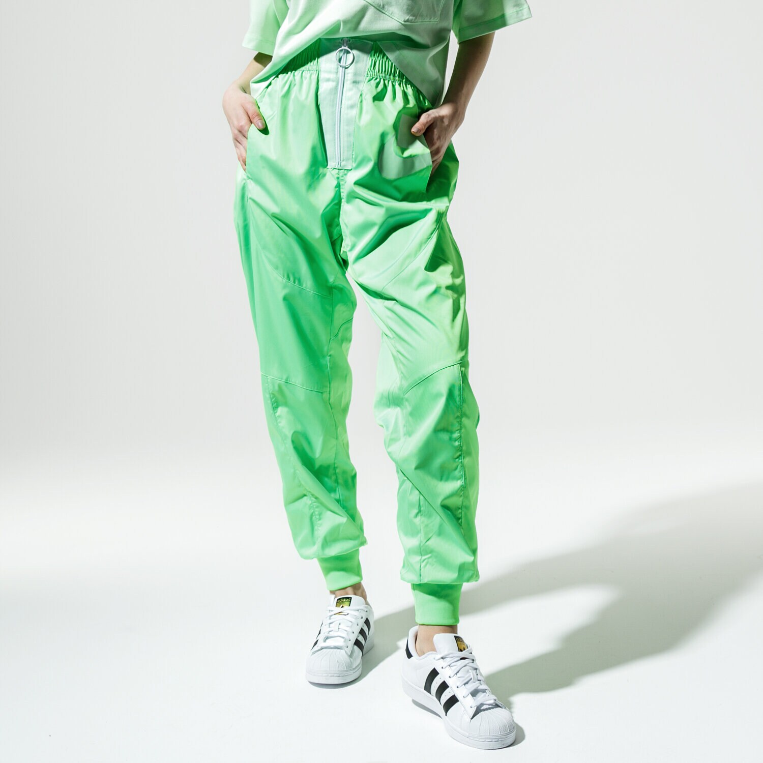 Femei pantaloni NIKE PANTALONI W NSW NSW PANT WVN CT0880-398 Verde