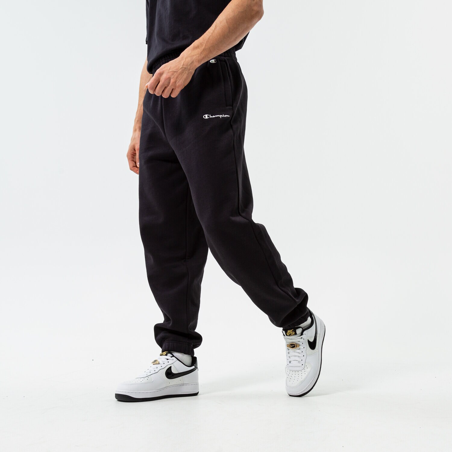 Bărbați pantaloni CHAMPION PANTALONI  LONG PANTS 216891KK001 Negru