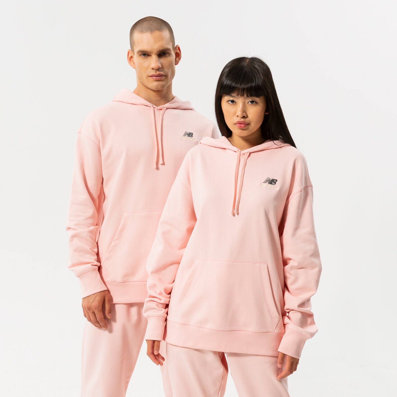 Femei bluză NEW BALANCE BLUZĂ CU GLUGĂ NB ESSENTIALS UNI-SSENTIALS PO HO UT21500PIE Roz