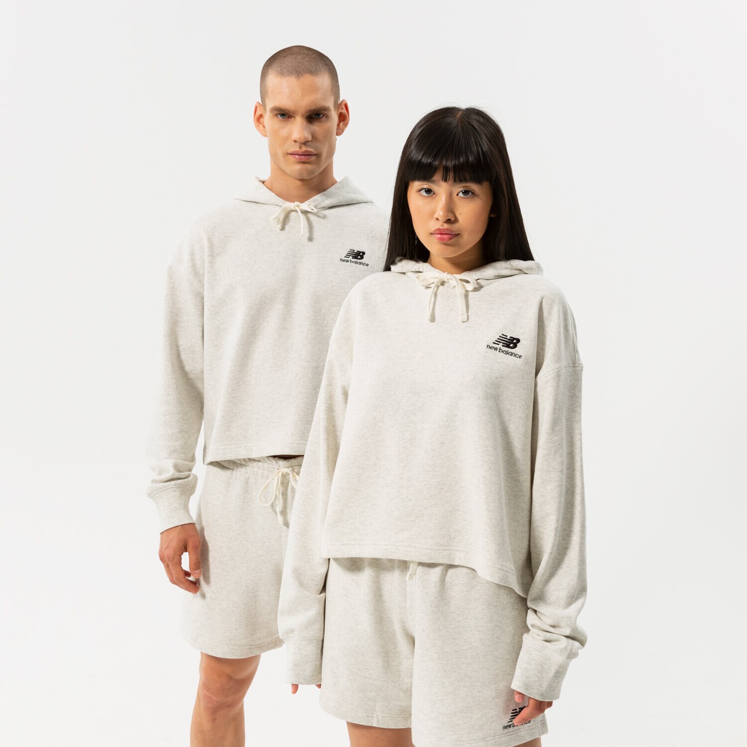 Femei bluză NEW BALANCE BLUZĂ CU GLUGĂ NB ESSENTIALS UNI-SSENTIALS CROP UT21502SAH Gri