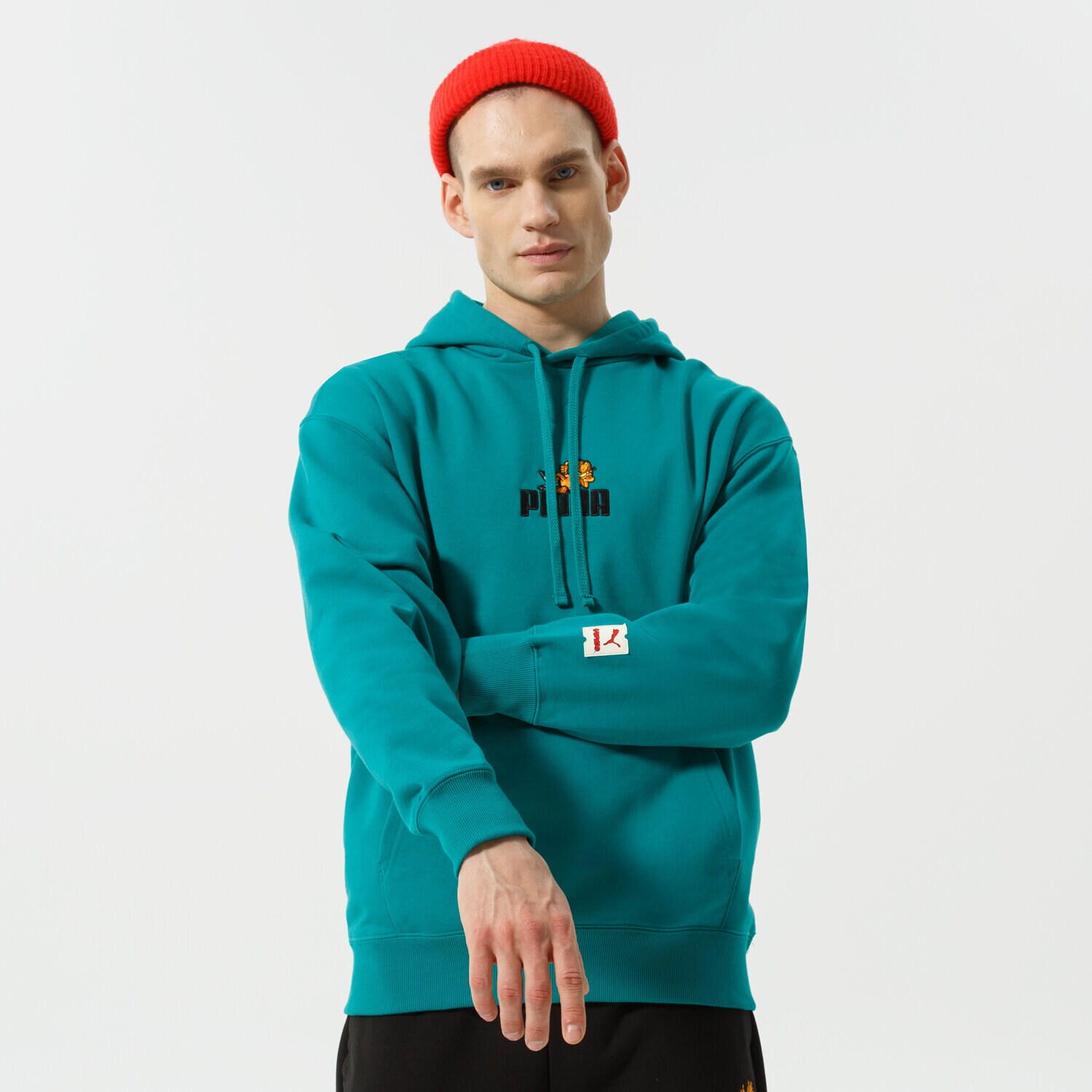 Bărbați bluză PUMA BLUZĂ CU GLUGĂ PUMA X GARFIELD HOODIE 534435 86 Verde