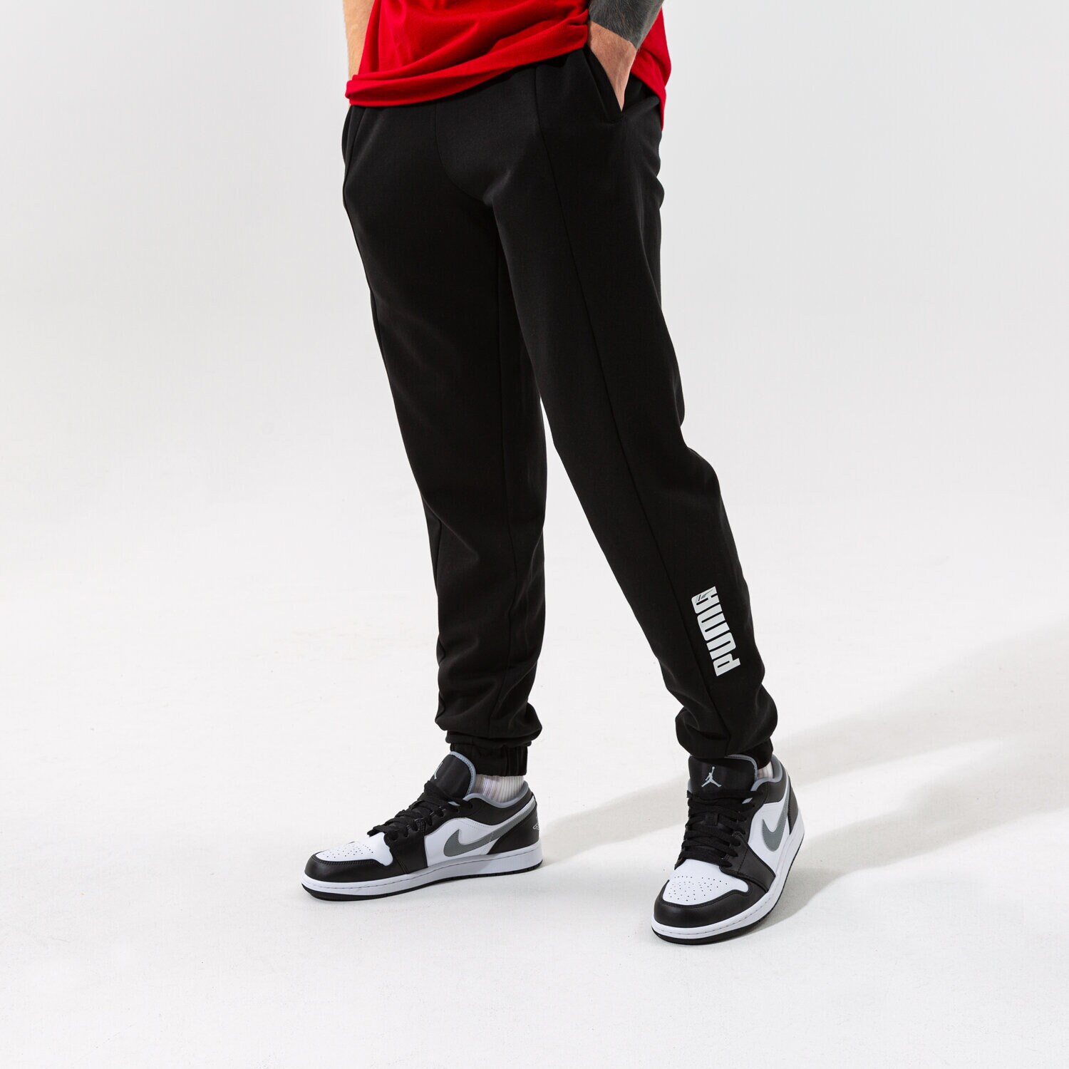 Bărbați pantaloni PUMA PANTALONI  RAD/CAL PANTS DK CL - PUMA BLACK 58939001 Negru