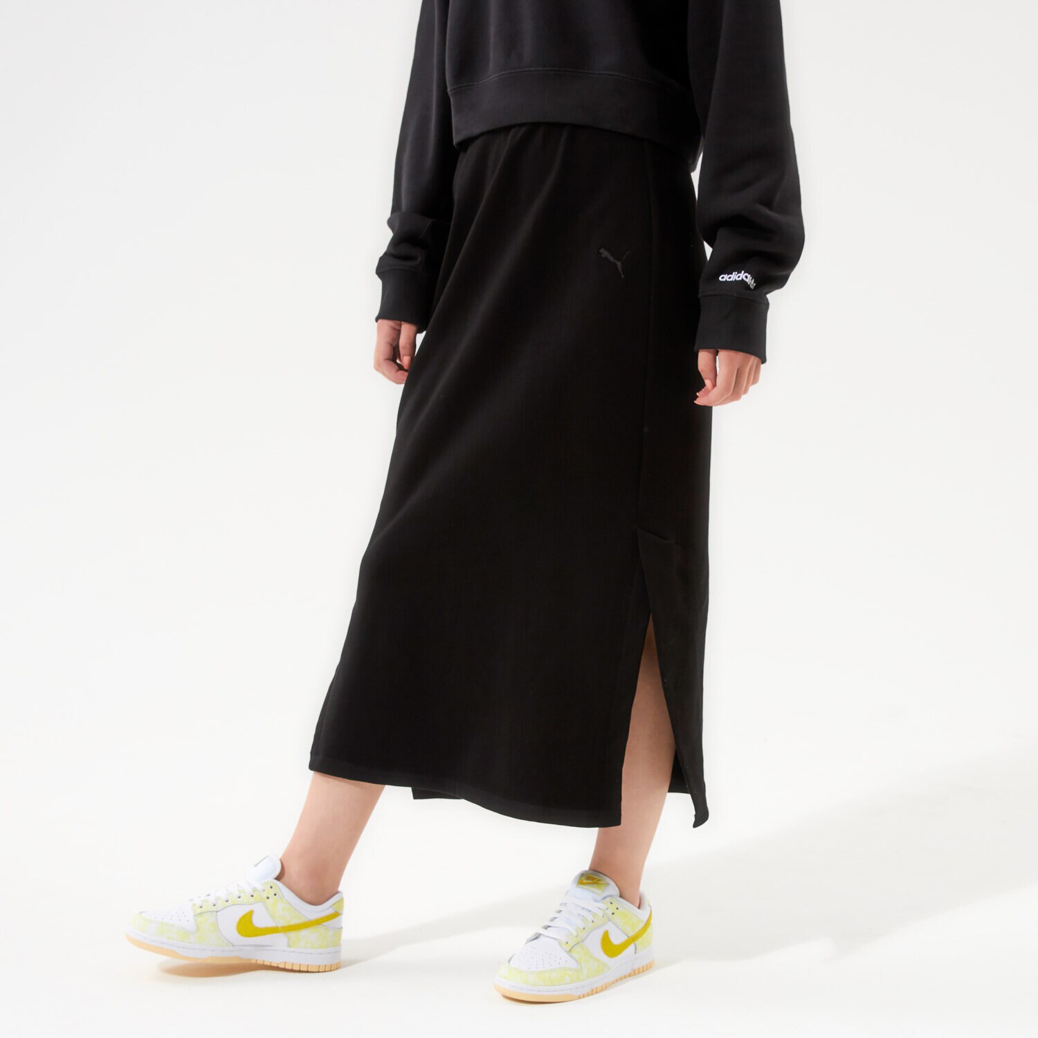 Femei rochii și fuste PUMA FUSTĂ HER SKIRT TR - PUMA BLACK 58952401 Negru