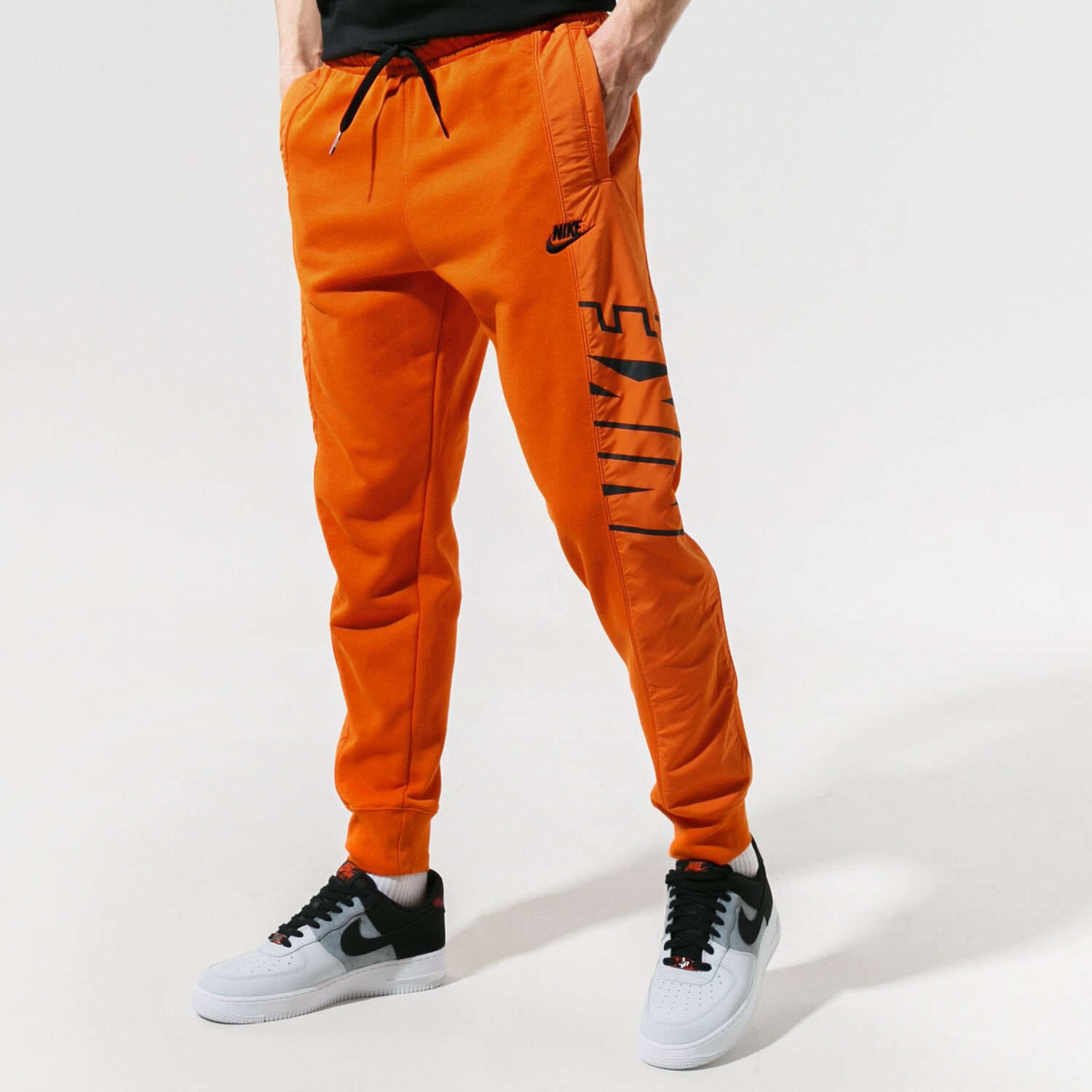 Bărbați pantaloni NIKE PANTALONI  SPORTSWEAR CZ9942-893 Portocaliu