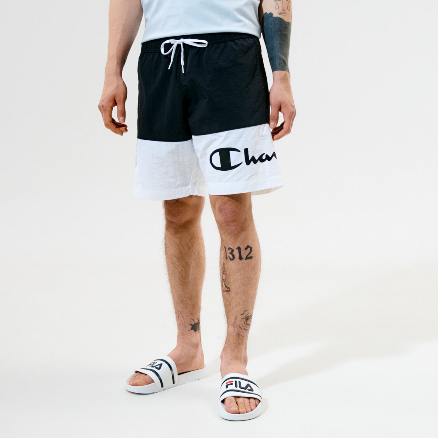 Femei pantaloni scurți CHAMPION PANTALONI SCURȚI BEACHSHORT 216070KK001 Negru