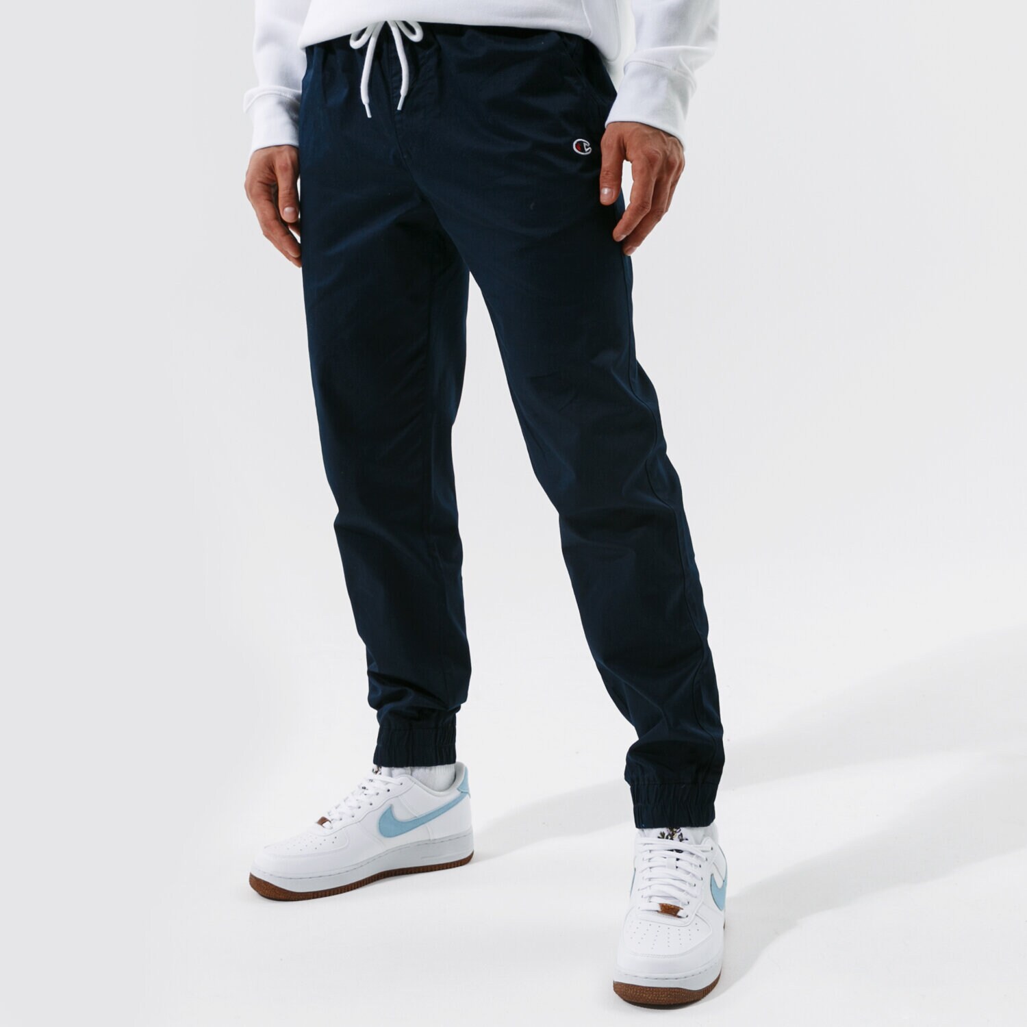 Bărbați pantaloni CHAMPION PANTALONI  ELASTIC CUFF PANTS 214366BS538 Bleumarin