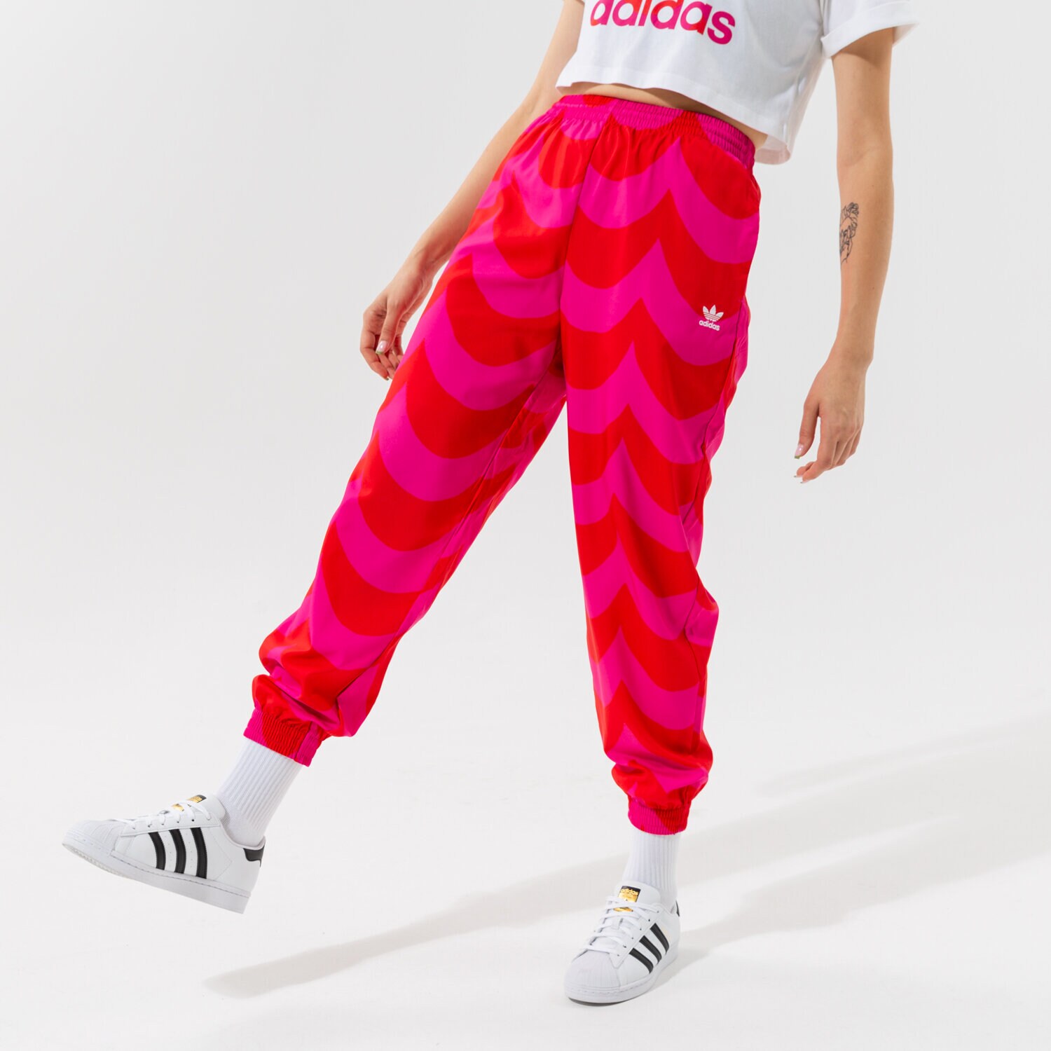 Femei pantaloni ADIDAS PANTALONI  TRACK PANT H20480 Roșu