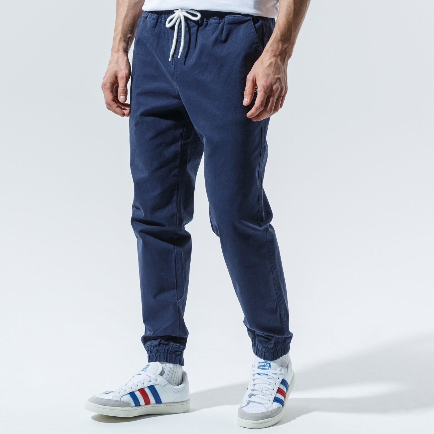 Bărbați pantaloni CHAMPION PANTALONI ELASTIC CUFF PANTS 215193BS538 Bleumarin