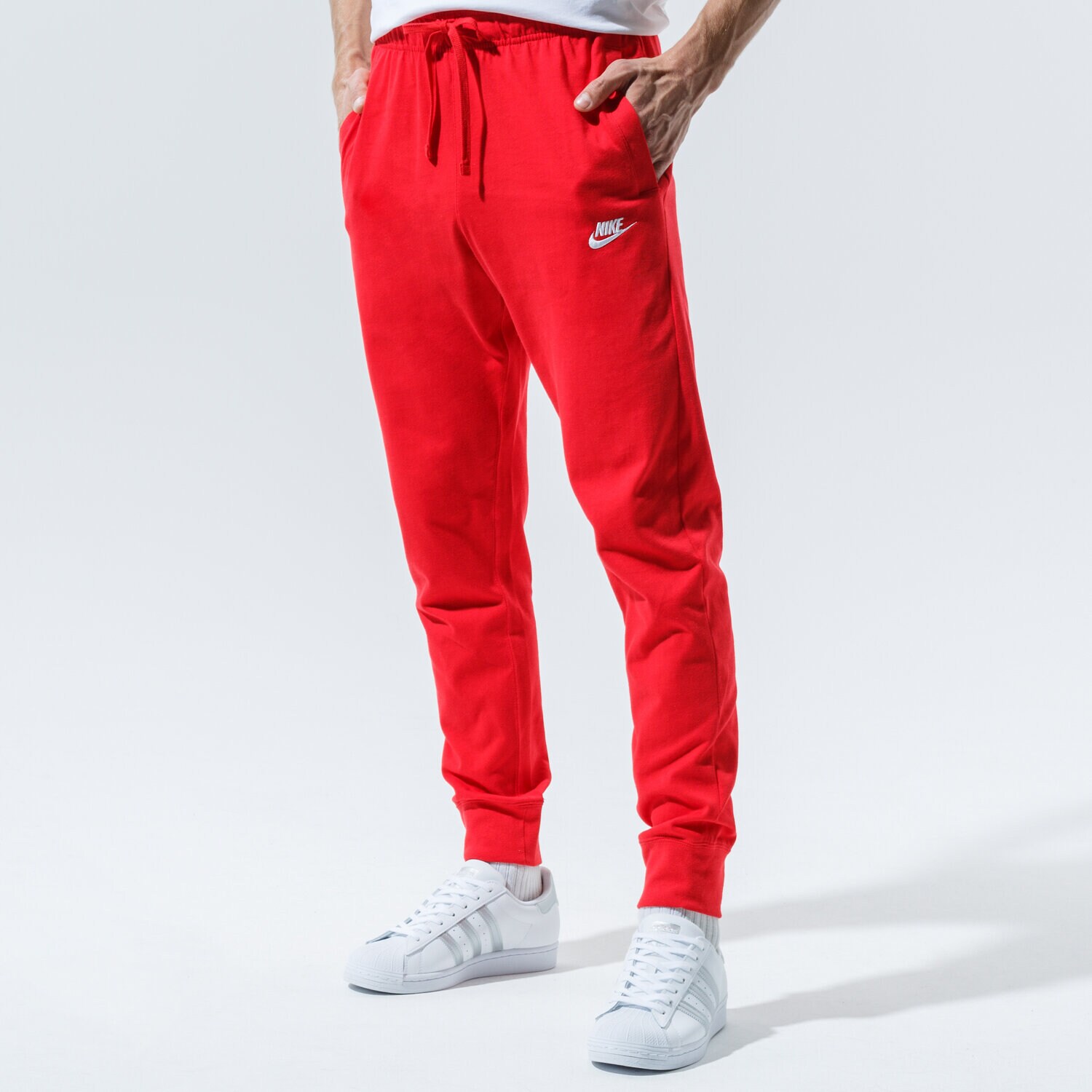 Bărbați pantaloni NIKE PANTALONI  M NSW CLUB JGGR JSY BV2762-657 Roșu