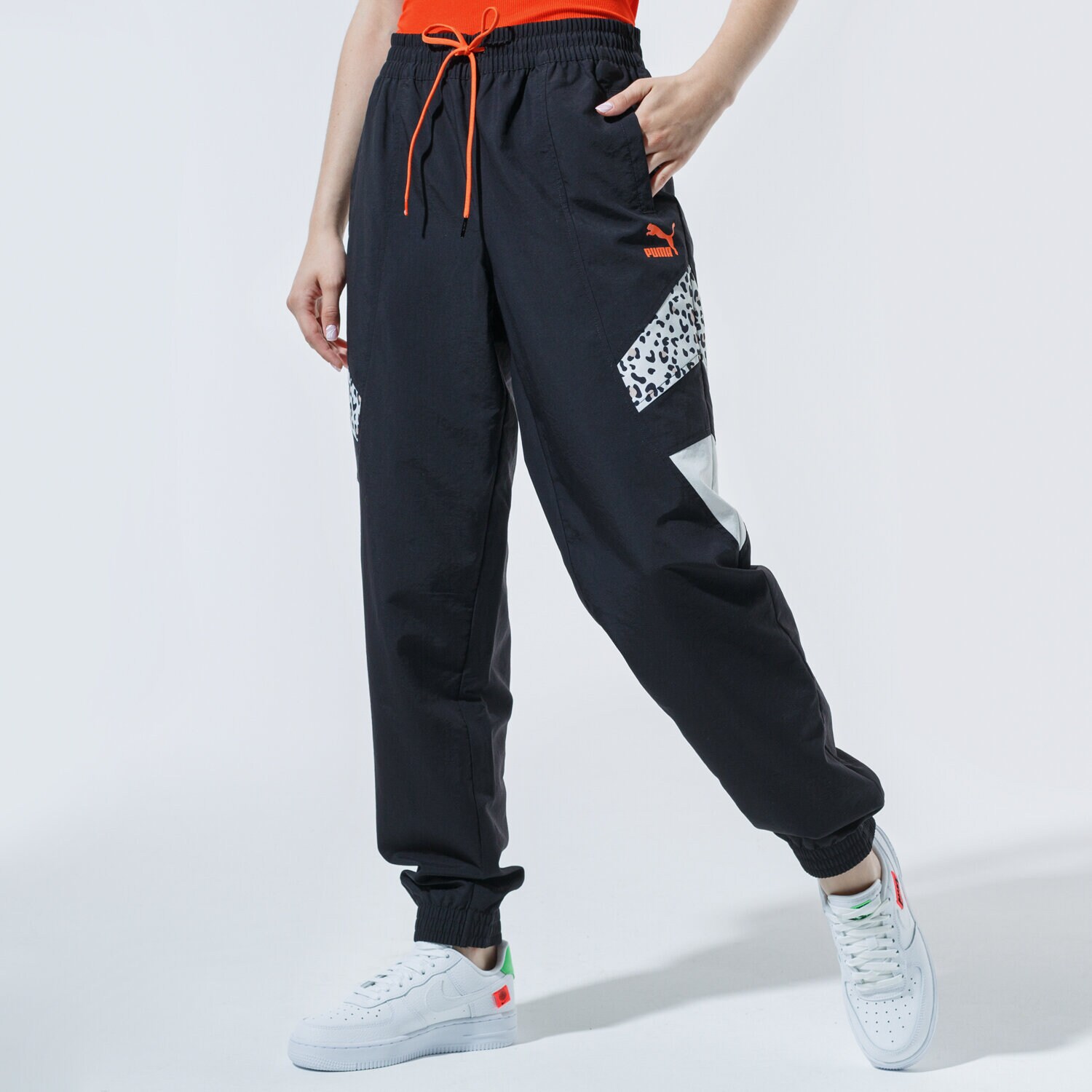 Femei pantaloni PUMA PANTALONI  TFS TRACK PANTS 59776101 Negru