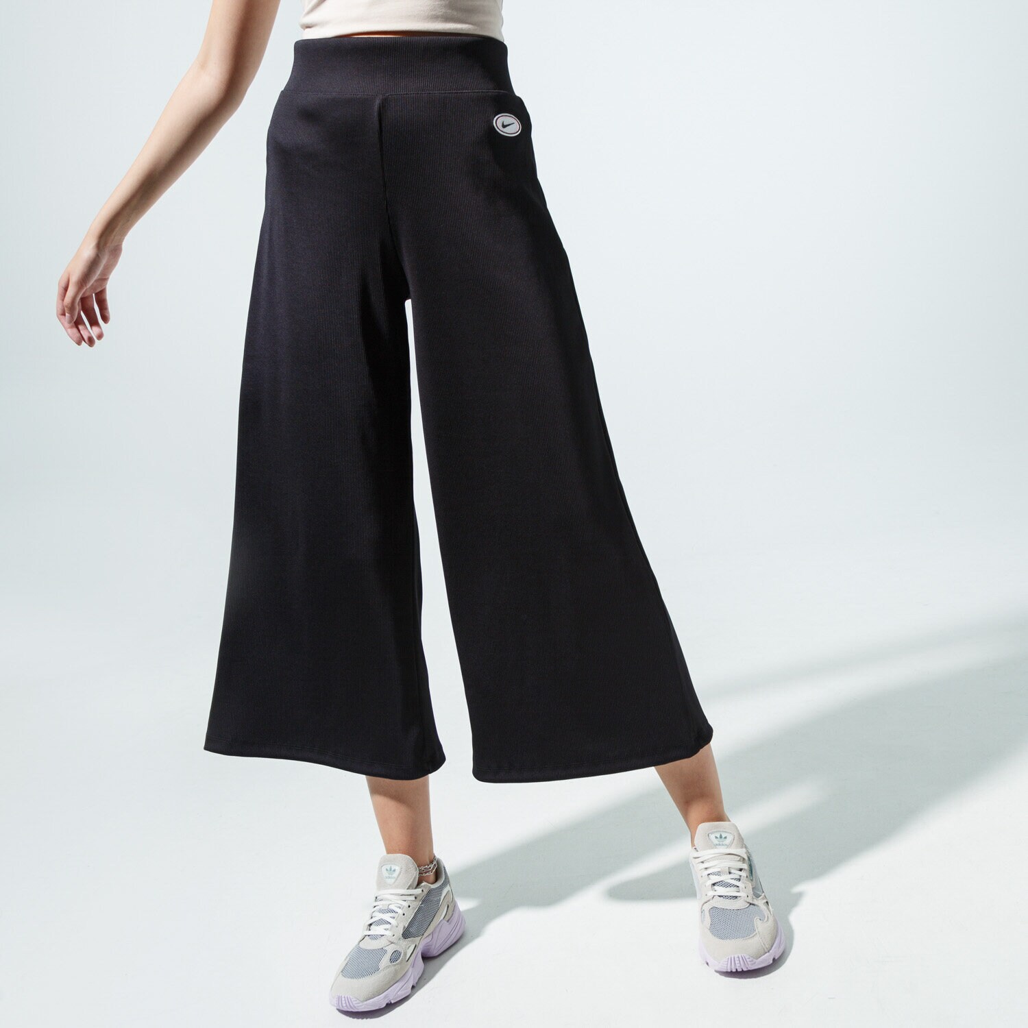 Femei pantaloni NIKE PANTALONI  SPORTSWEAR CU5356-010 Negru