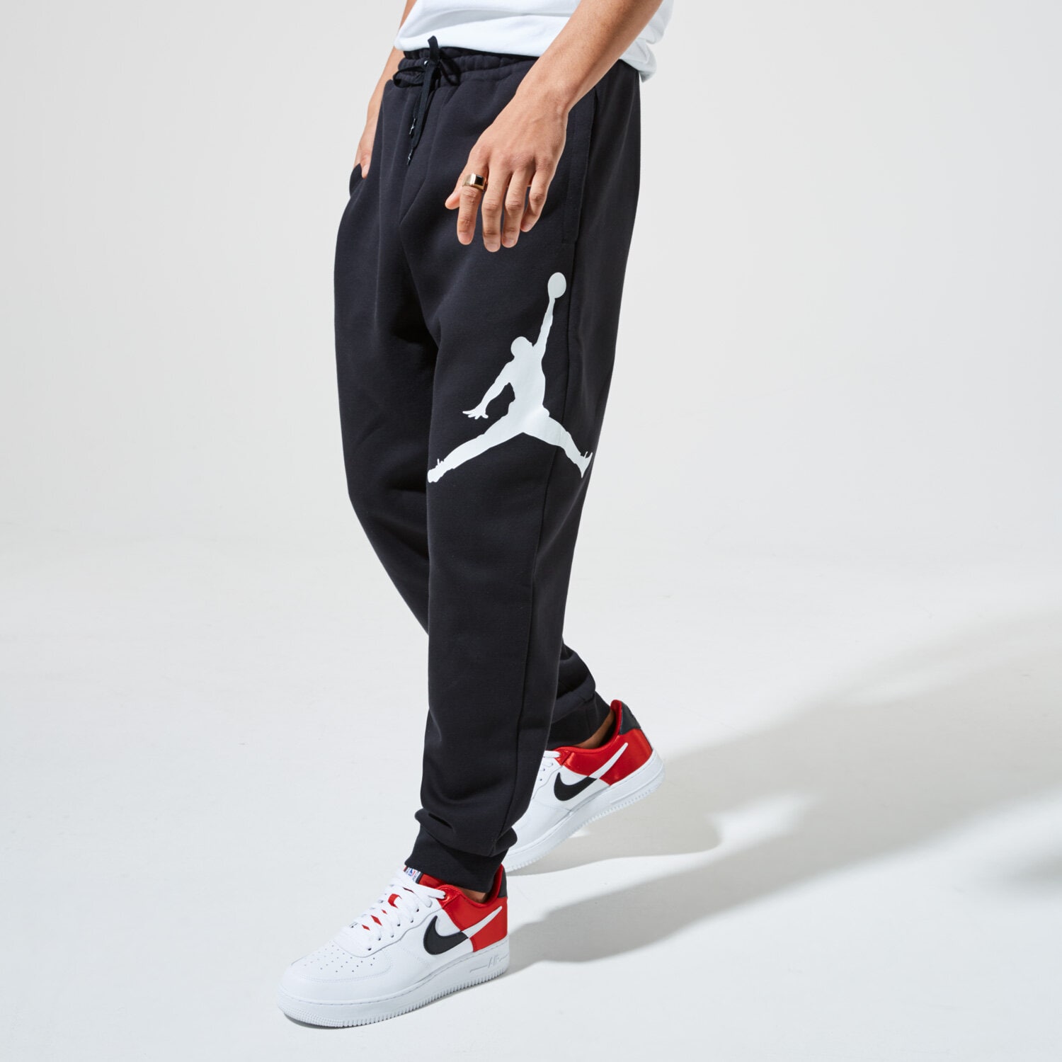 Bărbați pantaloni JORDAN PANTALONI  M J JUMPMAN LOGO FLC PANT BQ8646-010 Negru