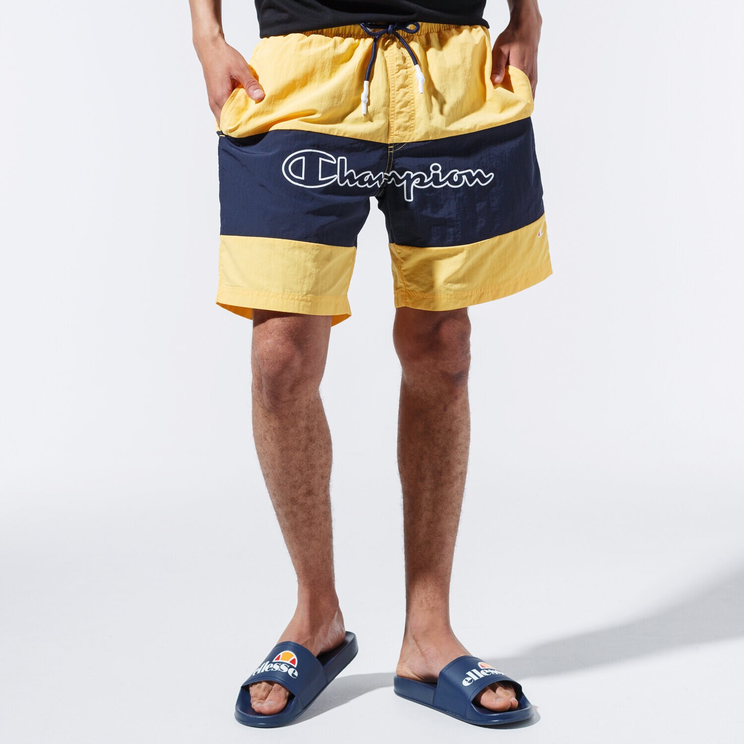 Femei pantaloni scurți CHAMPION PANTALONI SCURȚI LOGO SWIM SHORTS 215499YS001 Galben