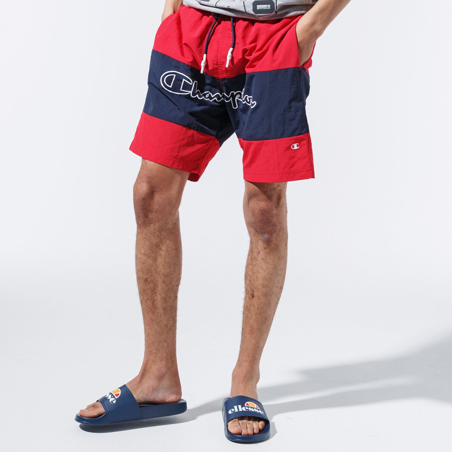 Femei pantaloni scurți CHAMPION PANTALONI SCURȚI LOGO SWIM SHORTS 215499RS001 Roșu