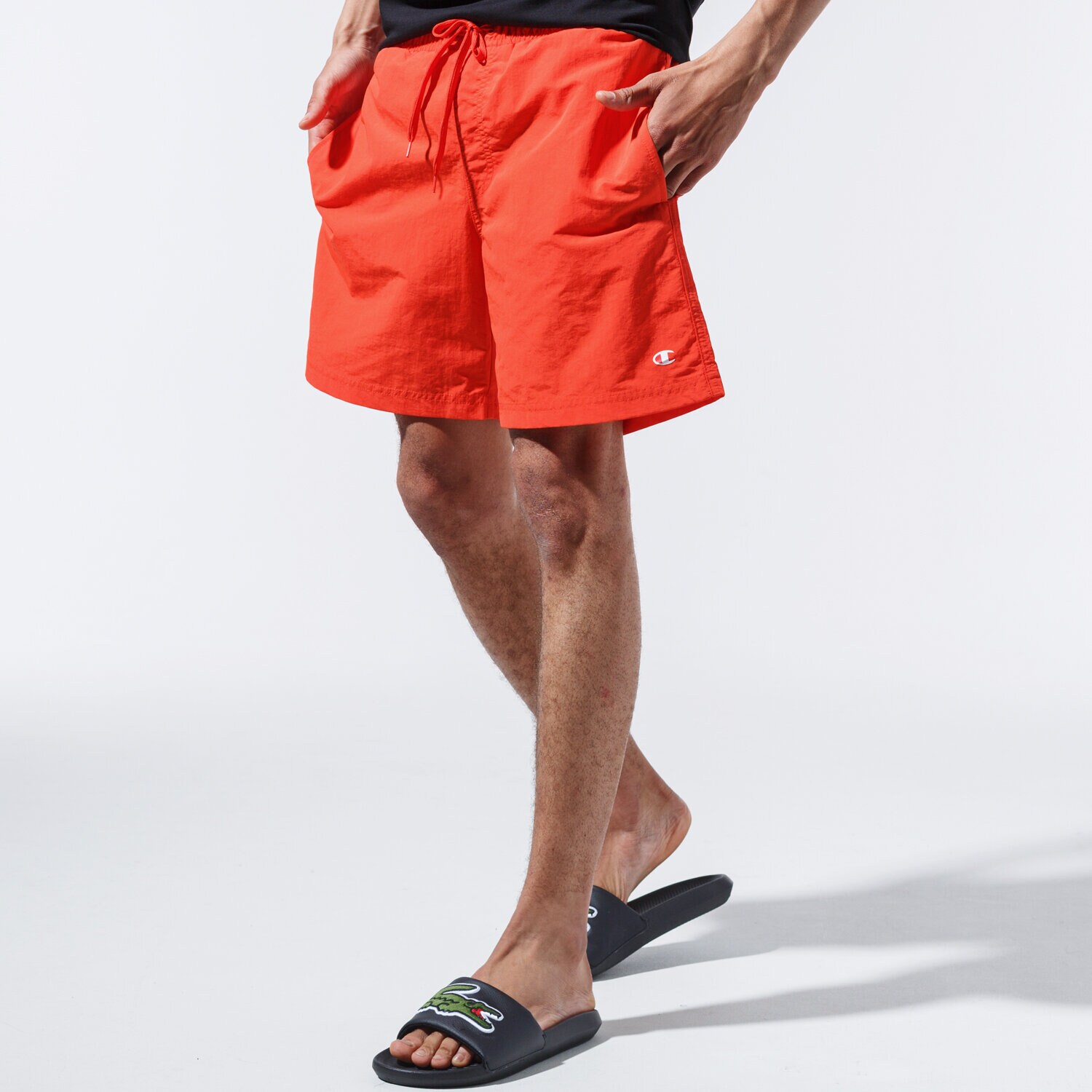 Femei pantaloni scurți CHAMPION PANTALONI SCURȚI BASIC SWIM SHORTS 215498YS057 Portocaliu