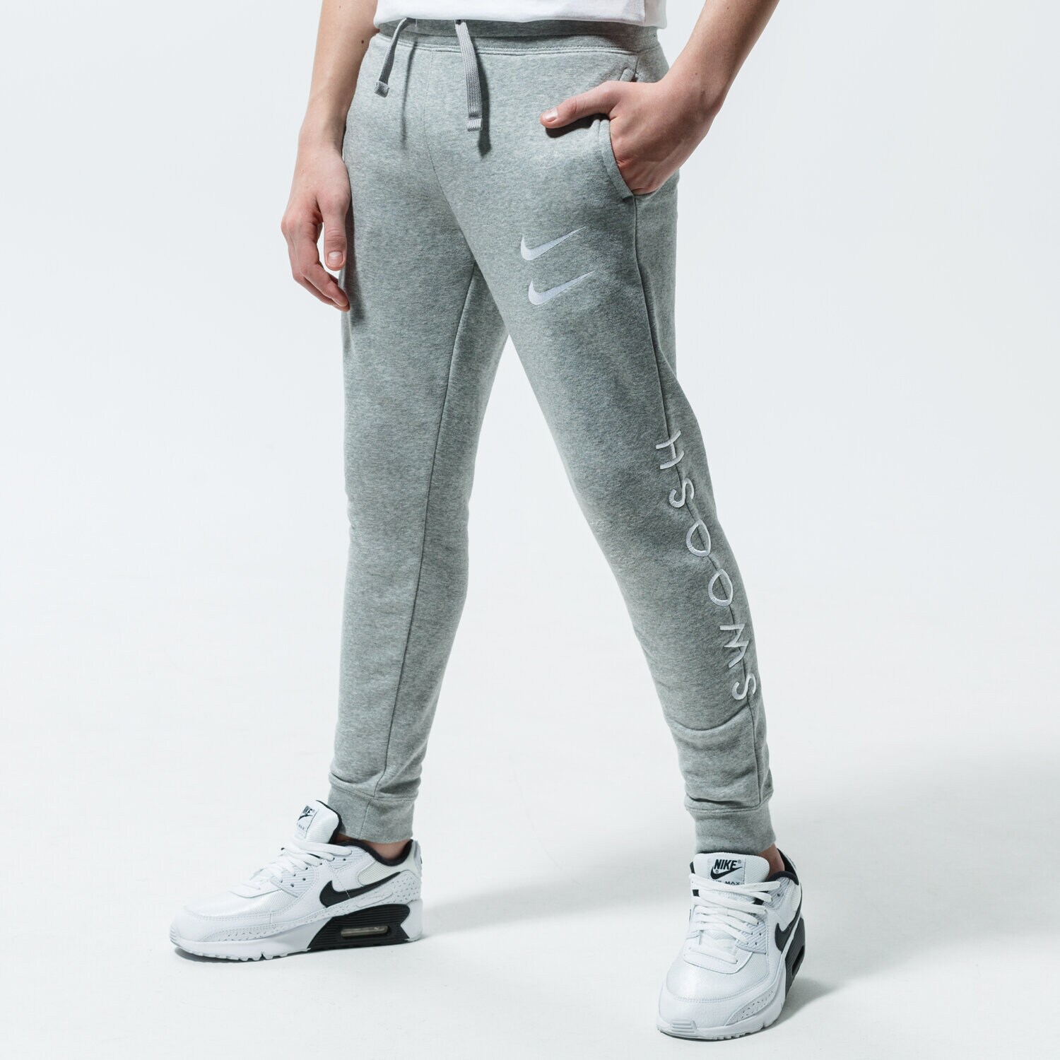 Pantaloni pentru copii NIKE PANTALONI  SPORTSWEAR SWOOSH CU9195-063 Gri