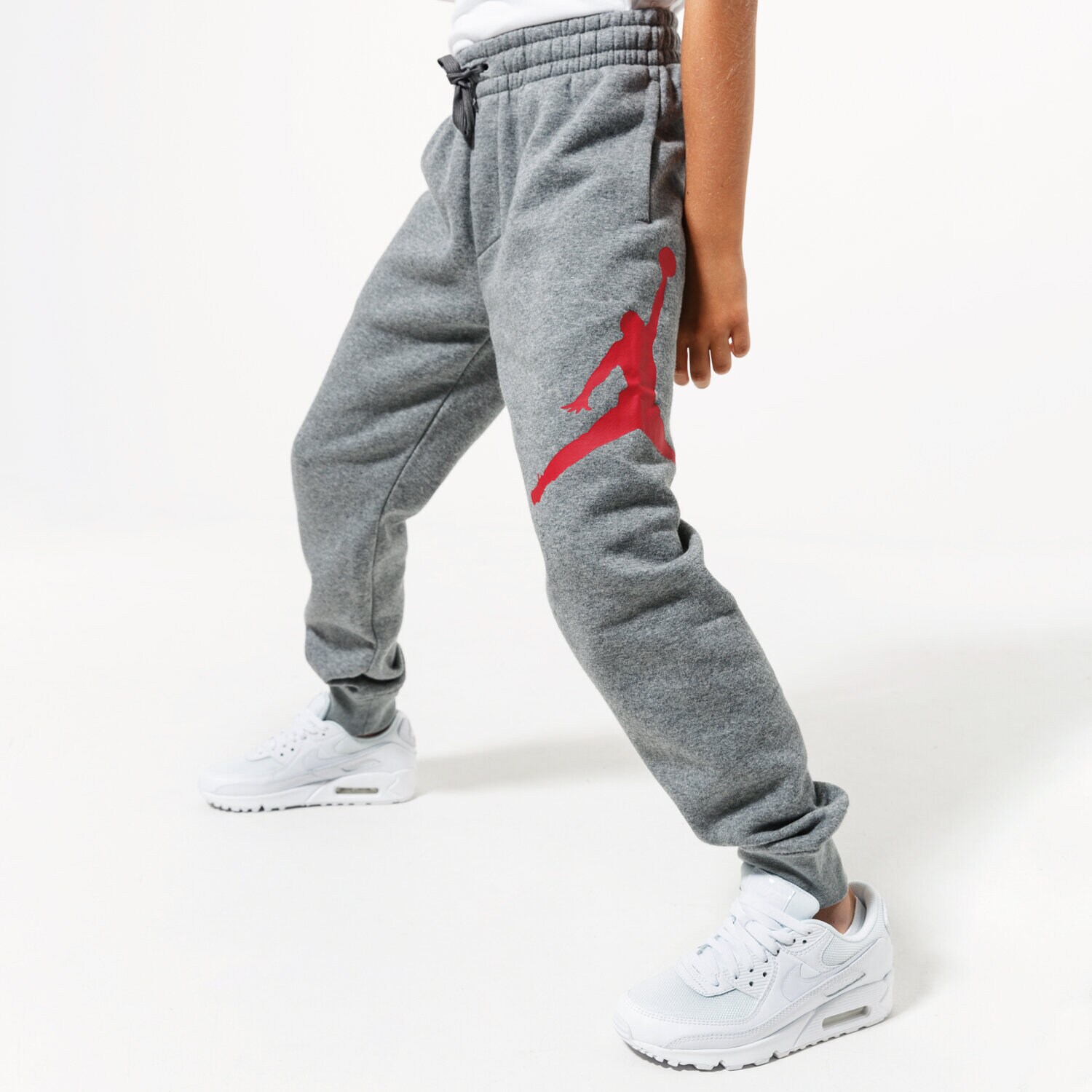 Pantaloni pentru copii JORDAN PANTALONI  JDB JUMPMAN LOGO FLEECE PANT BOY 956327-GEH Gri