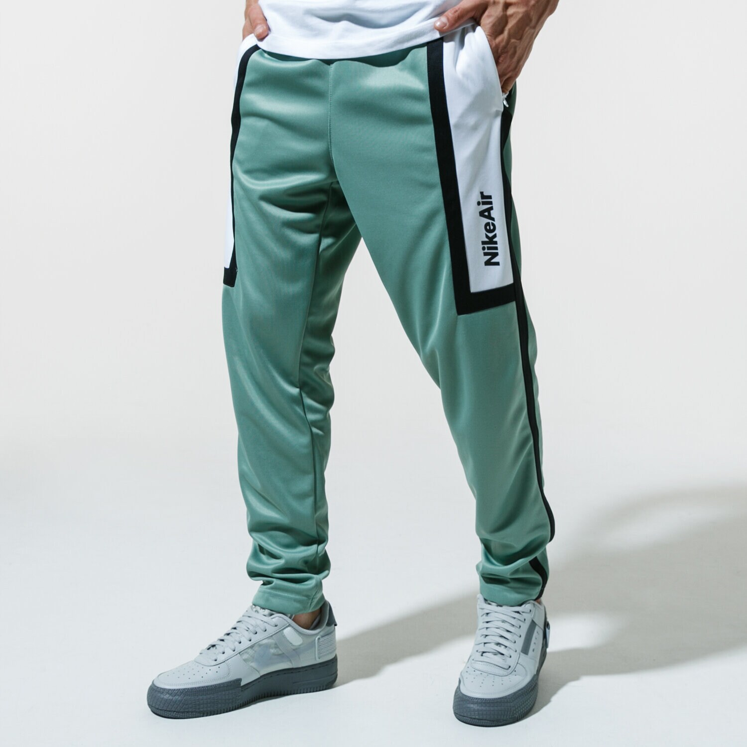 Bărbați pantaloni NIKE PANTALONI  AIR CJ4838-352 Verde