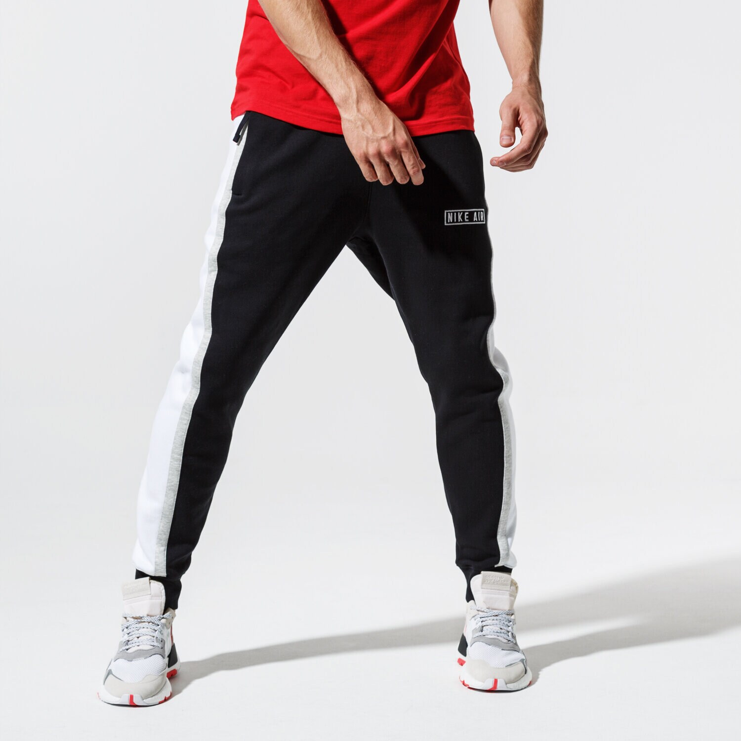Bărbați pantaloni NIKE PANTALONI  M NSW NIKE AIR PANT FLC BV5147-010 Negru