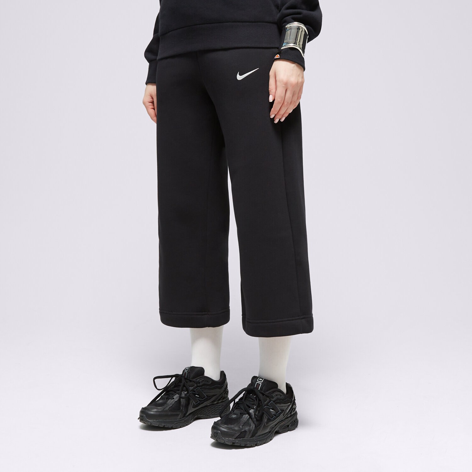 Femei pantaloni NIKE PANTALONI  W NSW PHNX FLC HR CROP SWTP FB8313-010 Negru