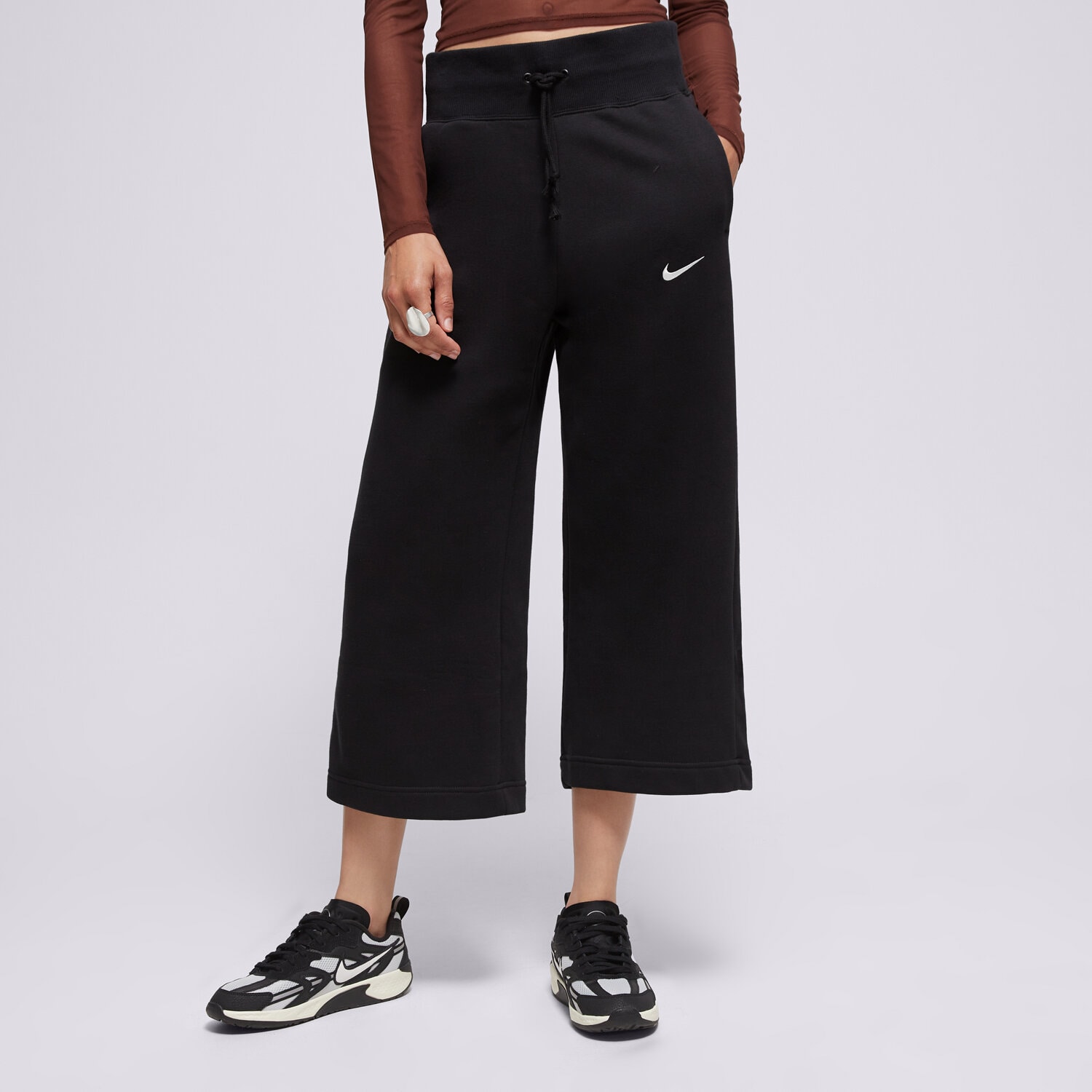 Femei pantaloni NIKE PANTALONI  W NSW PHNX FLC HR CROP SWTP FB8313-010 Negru